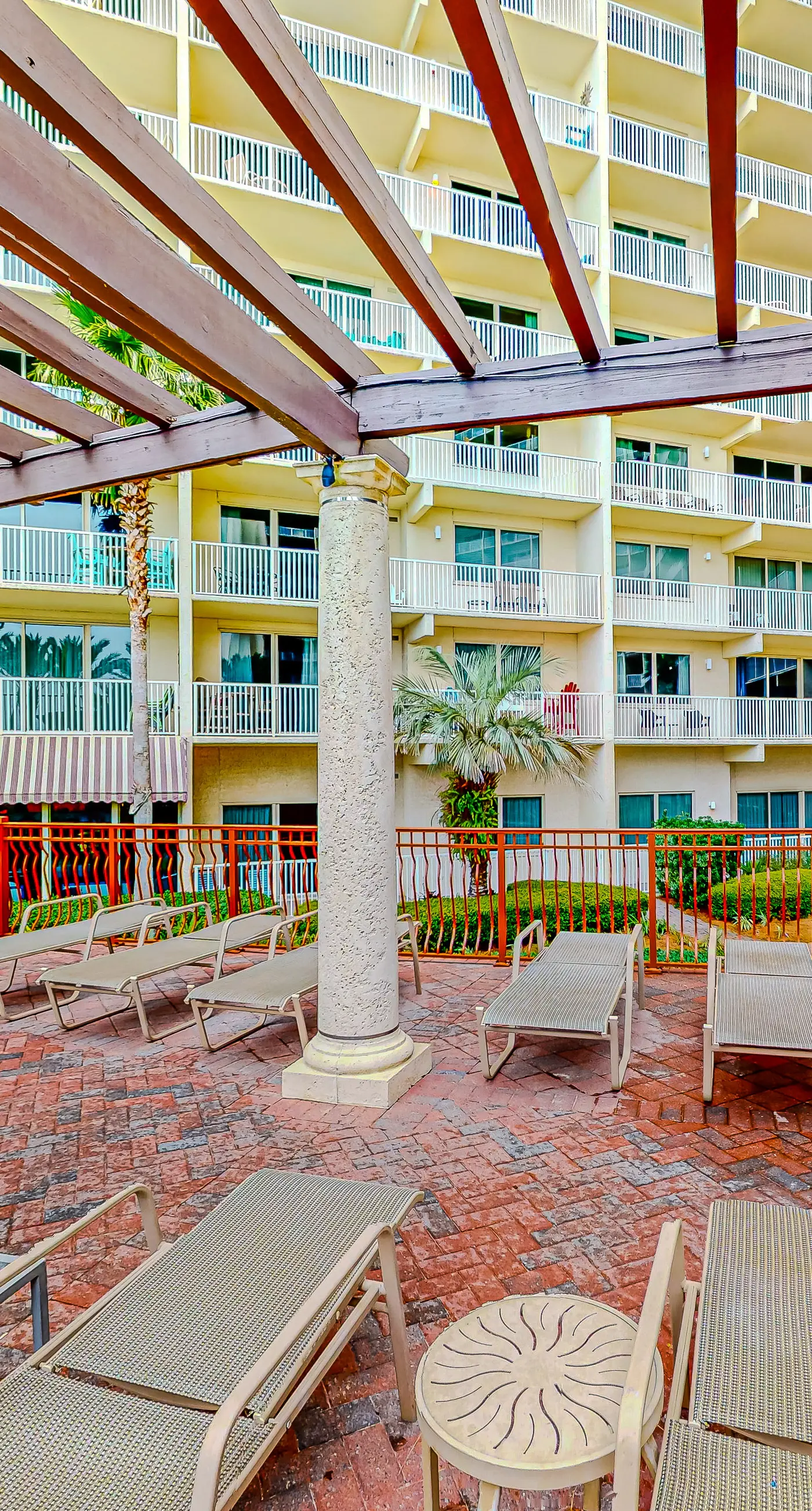 Gulf-front condo with sweeping views, pools, hot tubs, & easy beach
