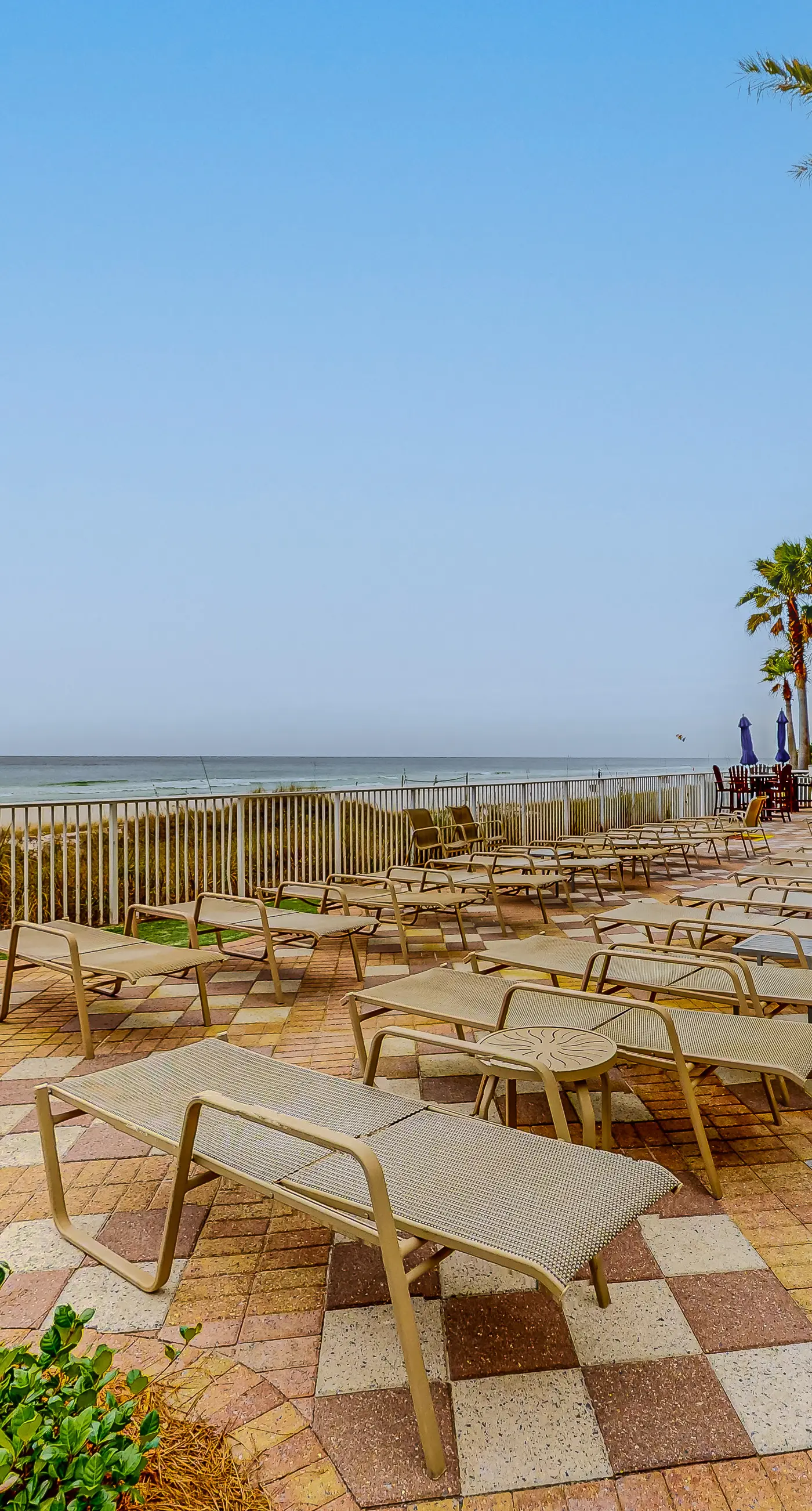 Gulf-front condo with sweeping views, pools, hot tubs, & easy beach