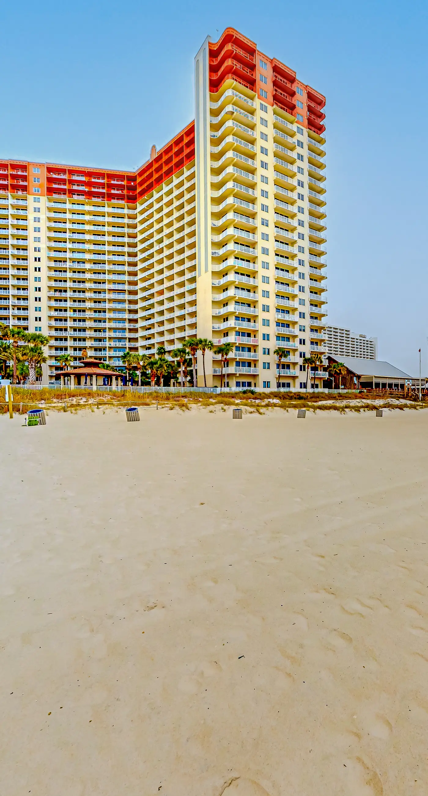 Gulf-front condo with sweeping views, pools, hot tubs, & easy beach