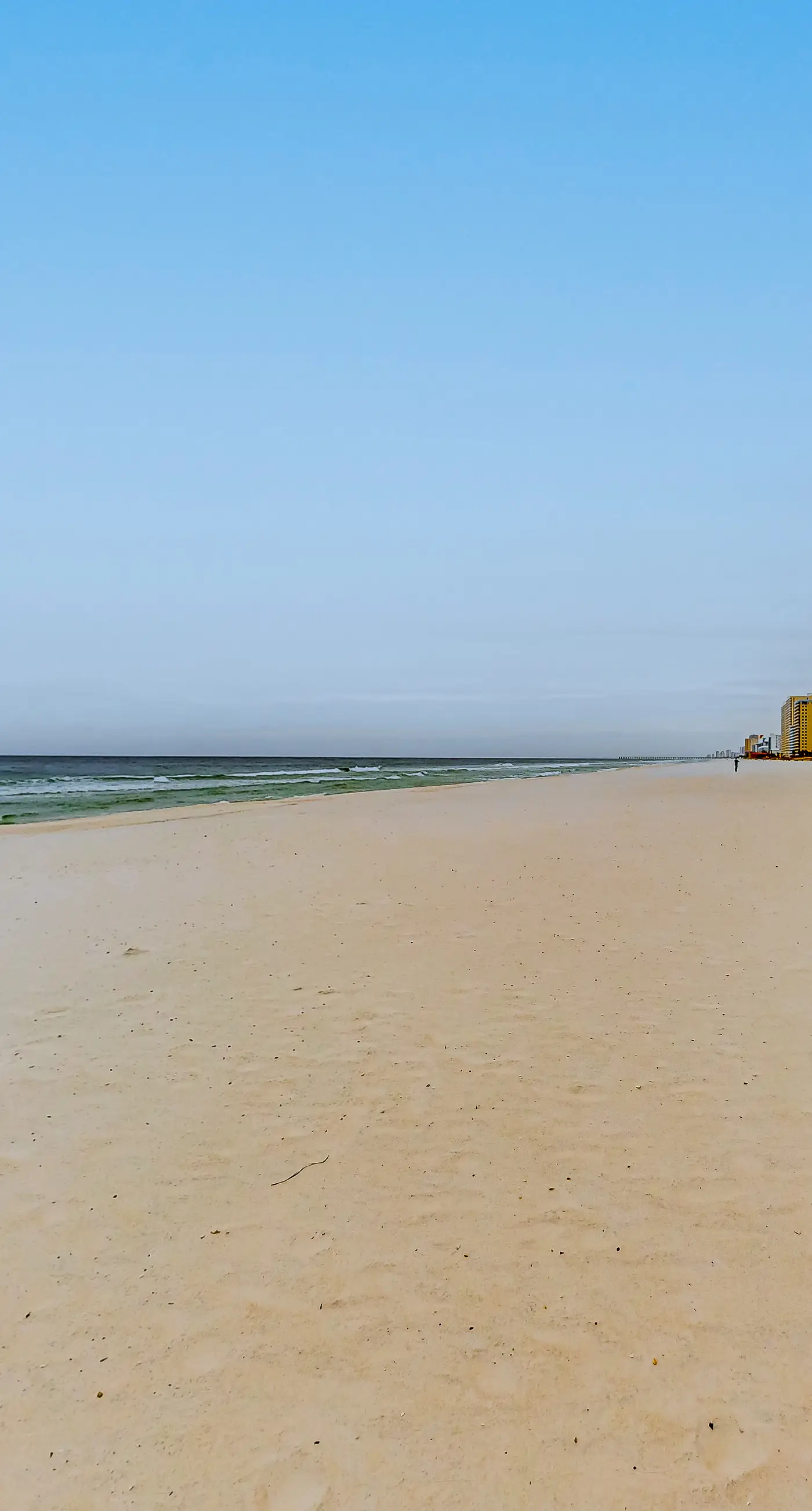 Gulf-front condo with sweeping views, pools, hot tubs, & easy beach