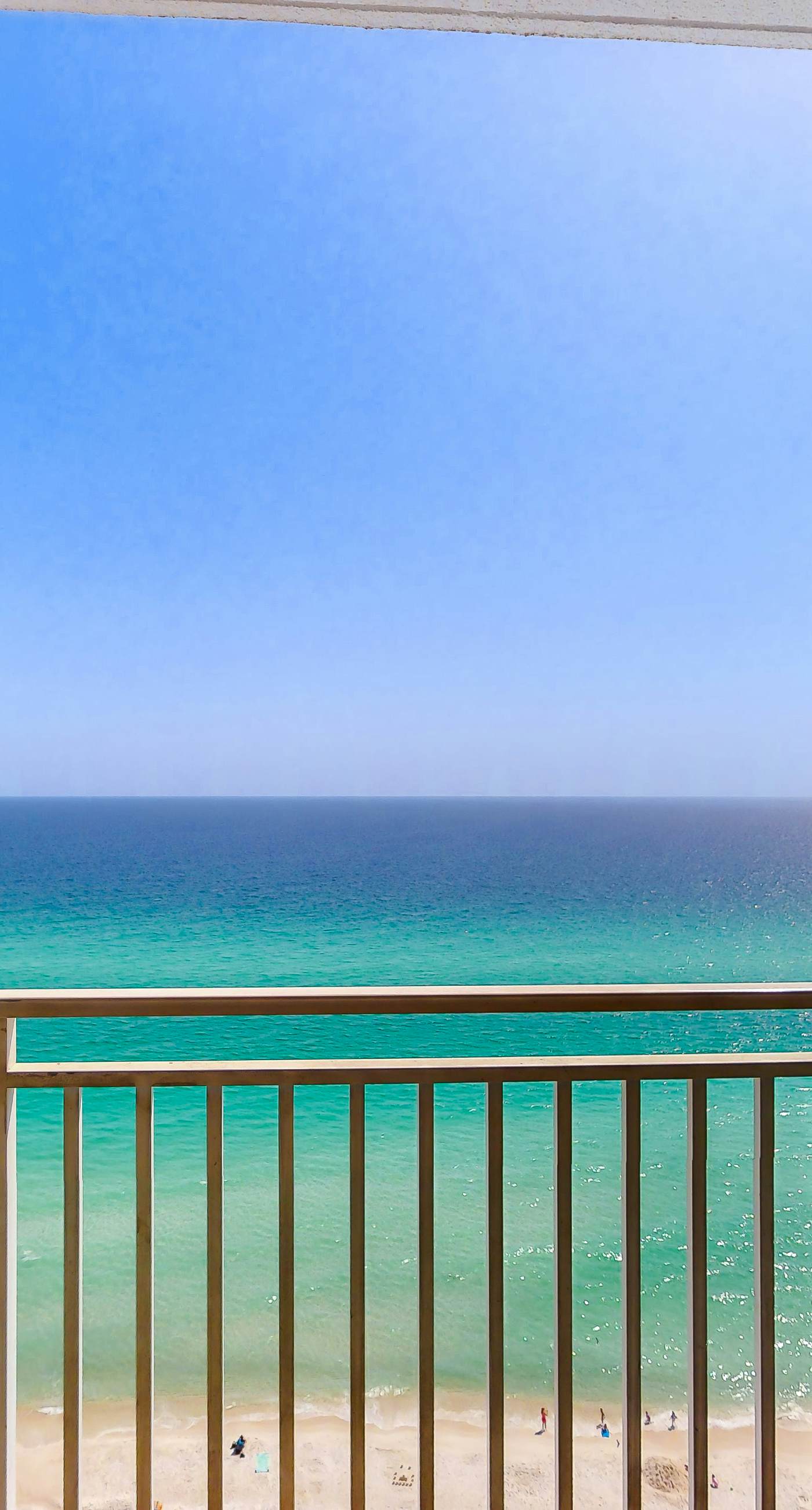 Gulf-view escape near the beach with pool, hot tub, balcony & w/d