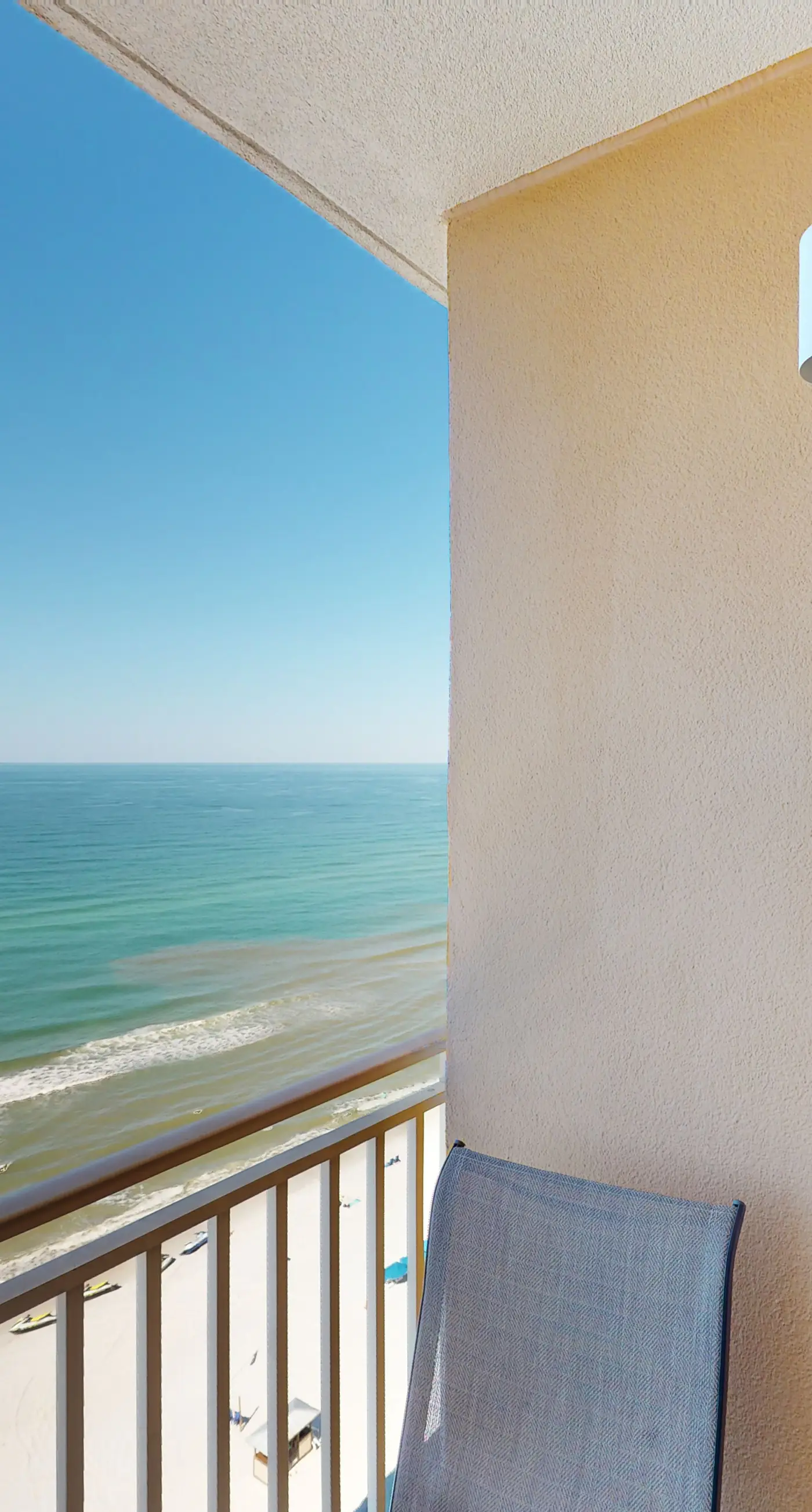 Gulf-front condo with pool, hot tub, balcony, & complimentary beach service