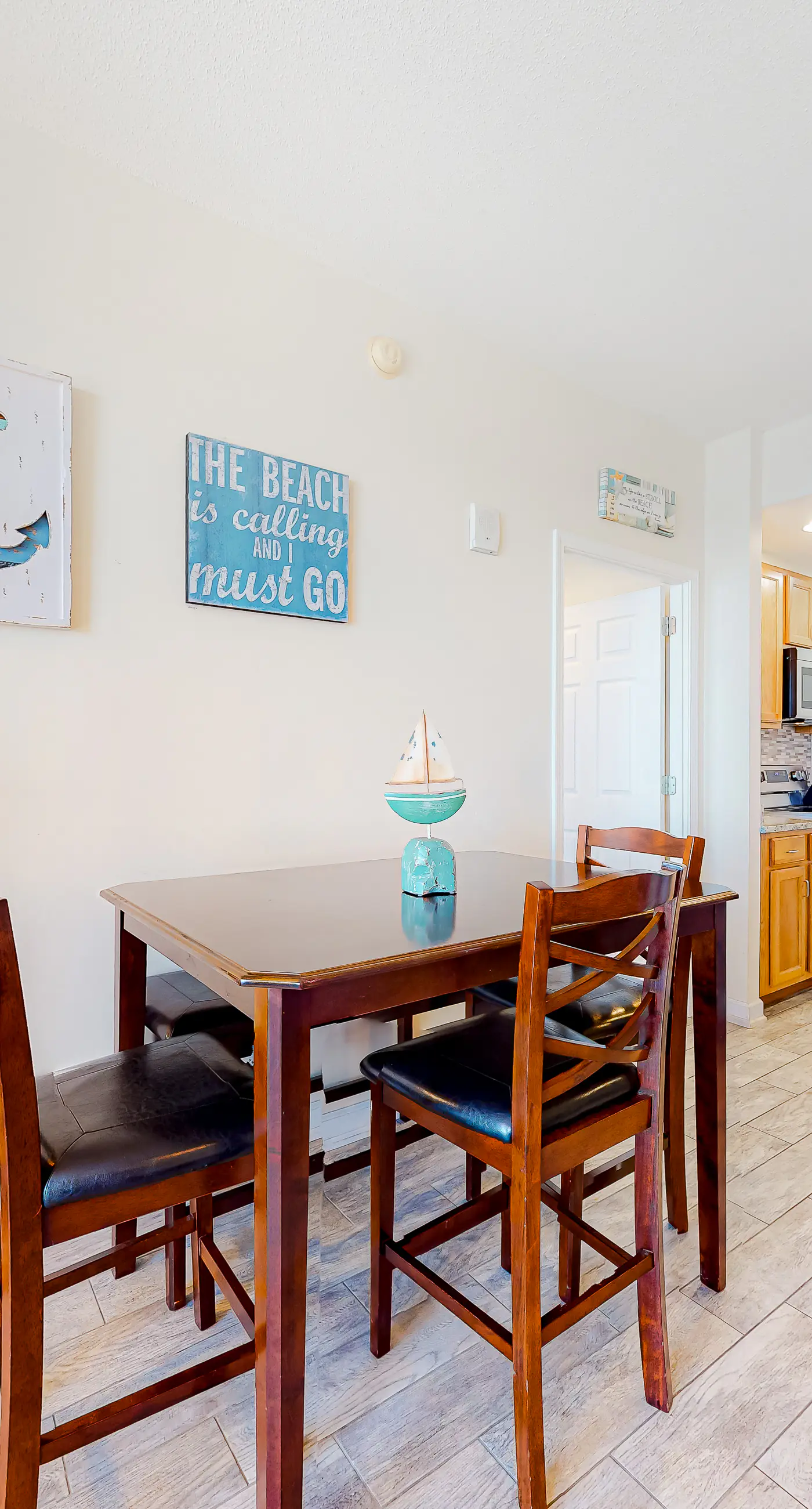 Beachfront condo with pool, fitness center & grills