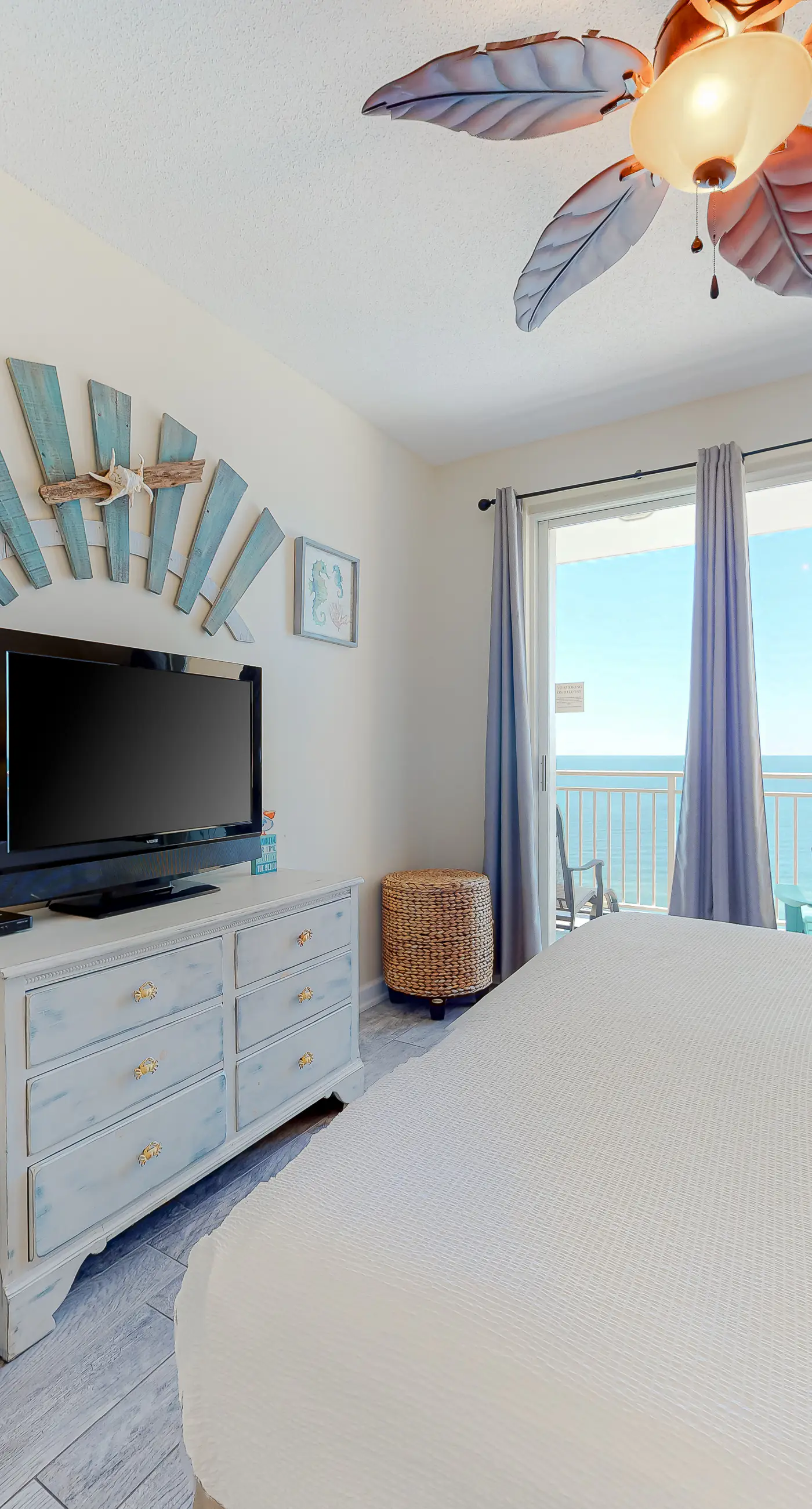 Beachfront condo with pool, fitness center & grills