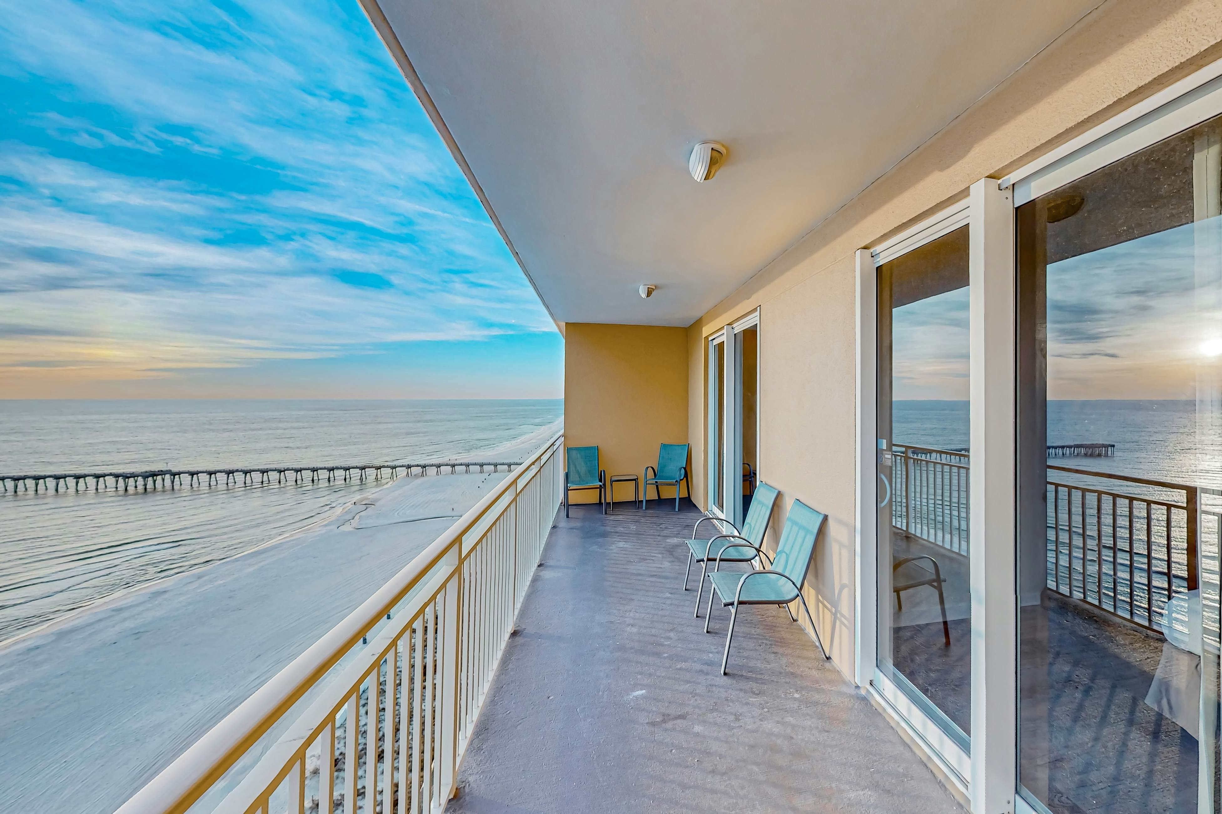 14th-floor oceanfront condo with Gulf views, outdoor pool, balcony, W/D, & AC