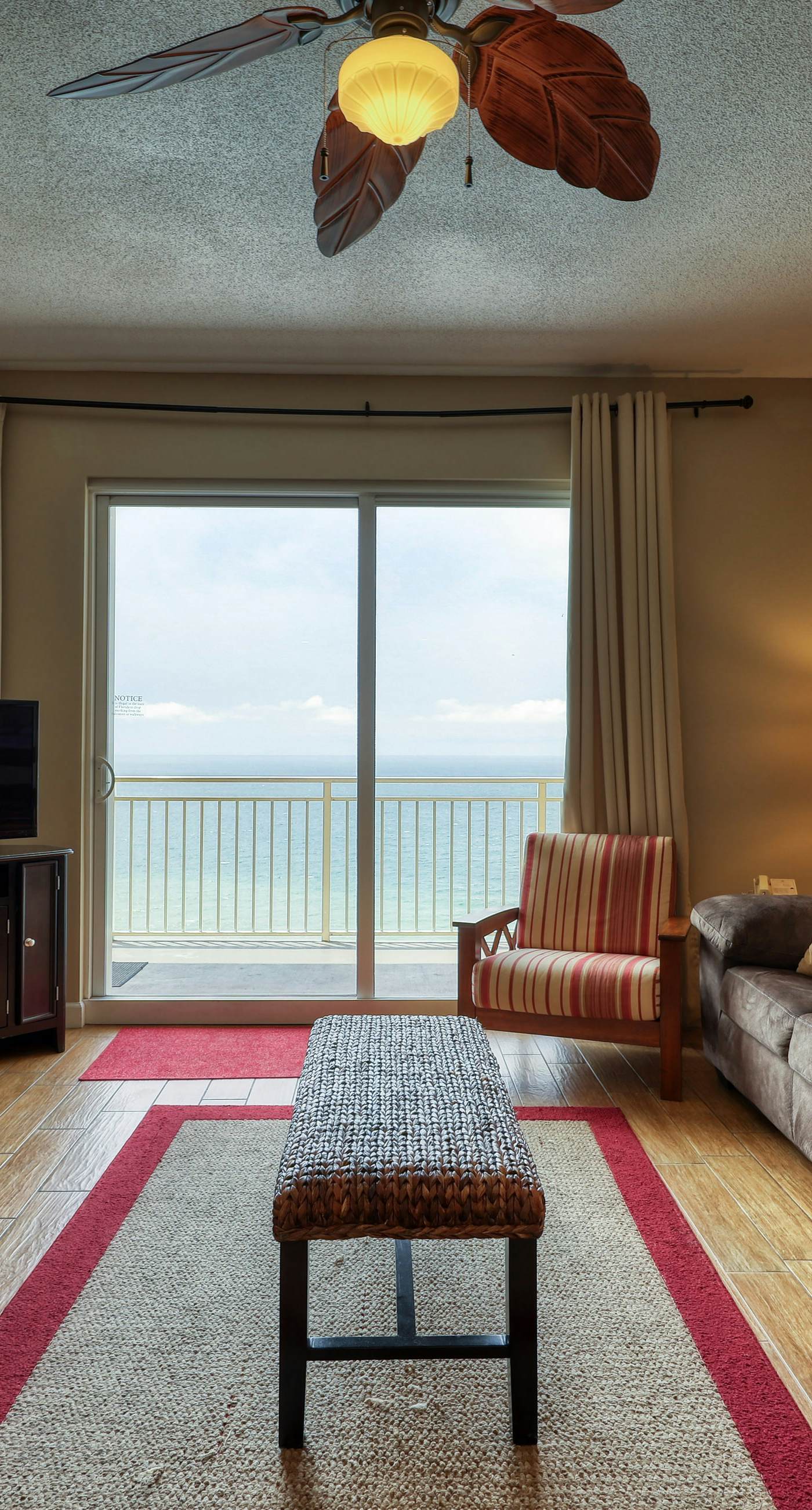 Waterfront condo with furnished balcony, pool, gym & beach