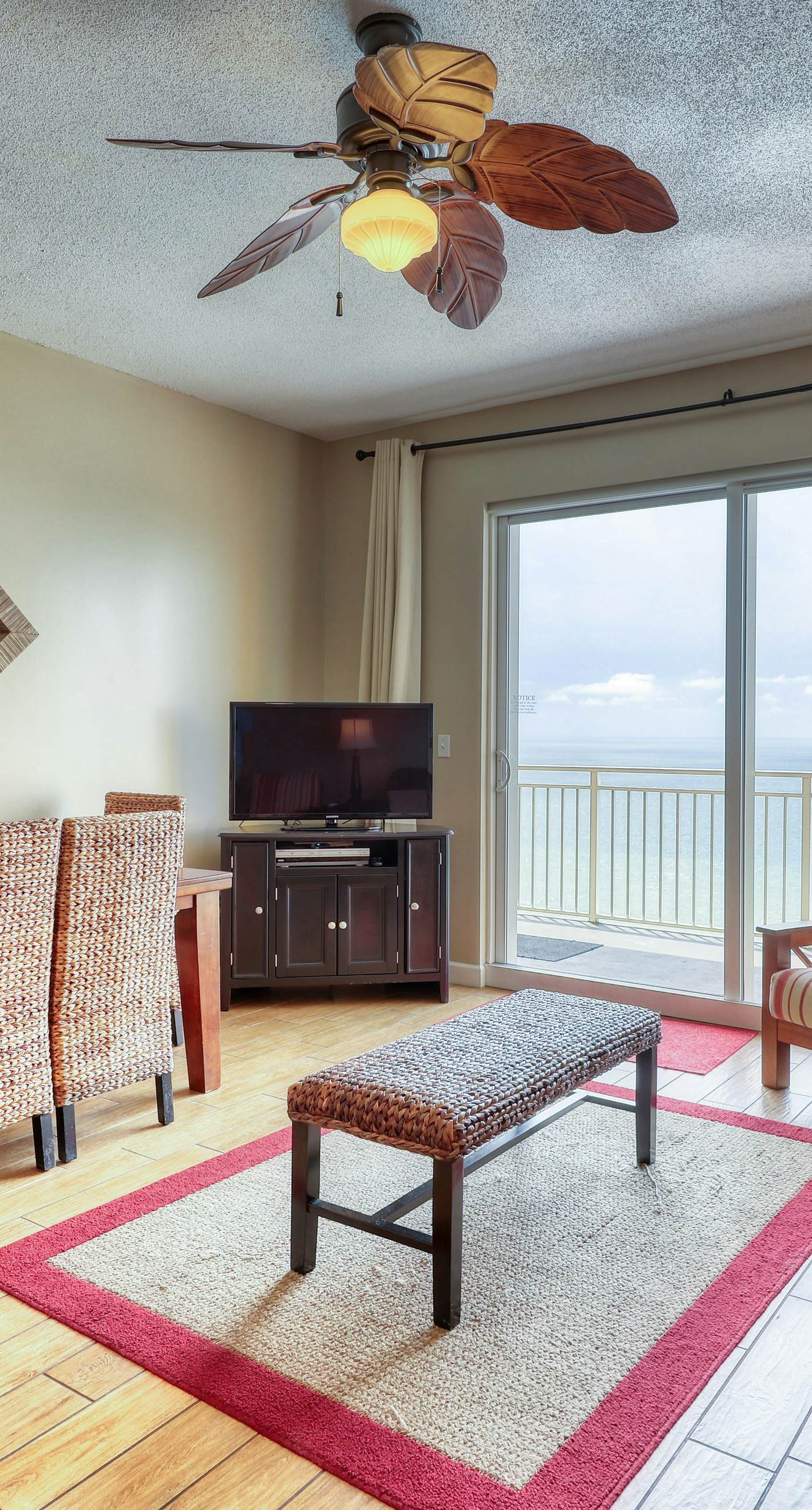 Waterfront condo with furnished balcony, pool, gym & beach