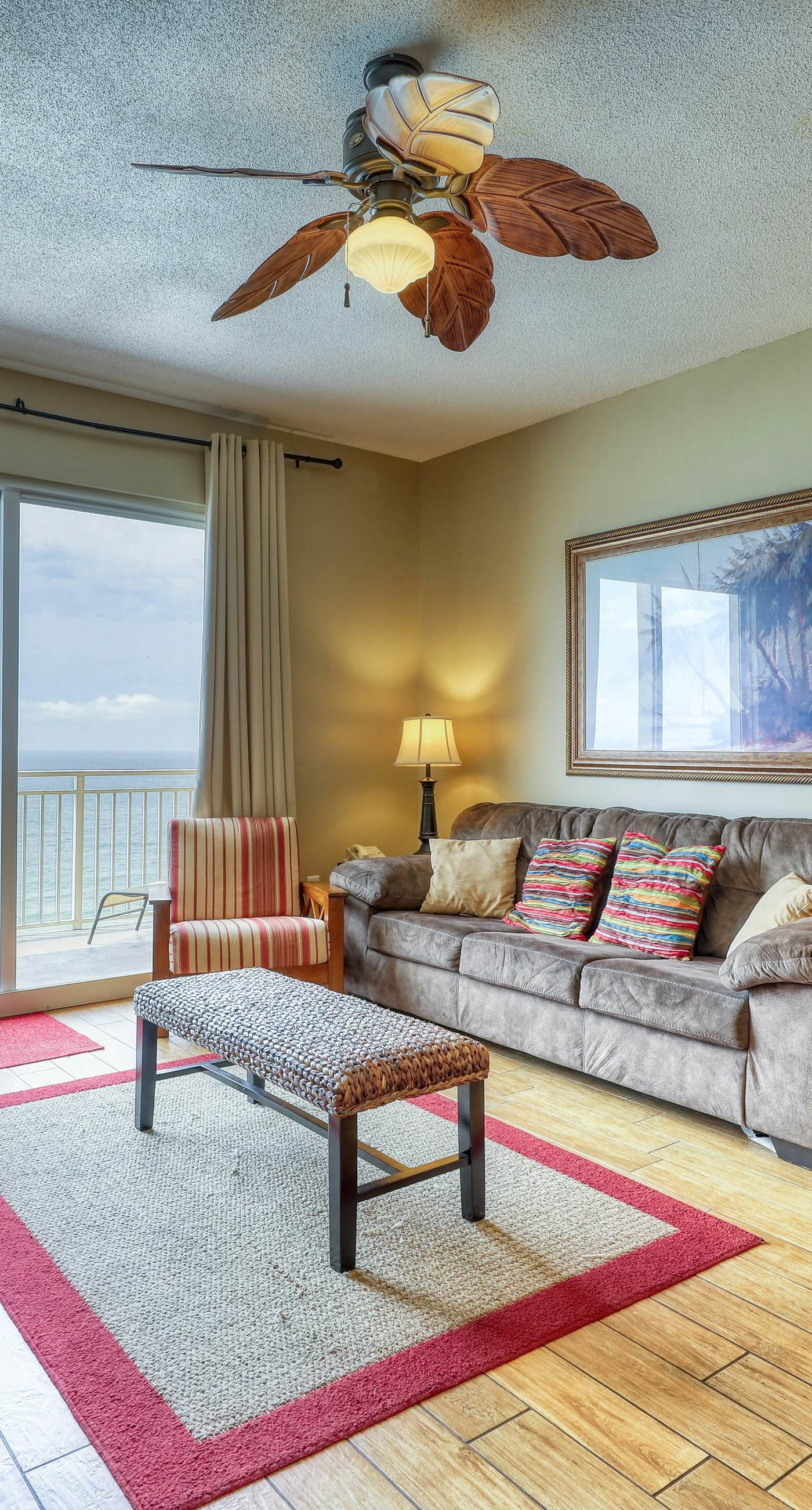 Waterfront condo with furnished balcony, pool, gym & beach