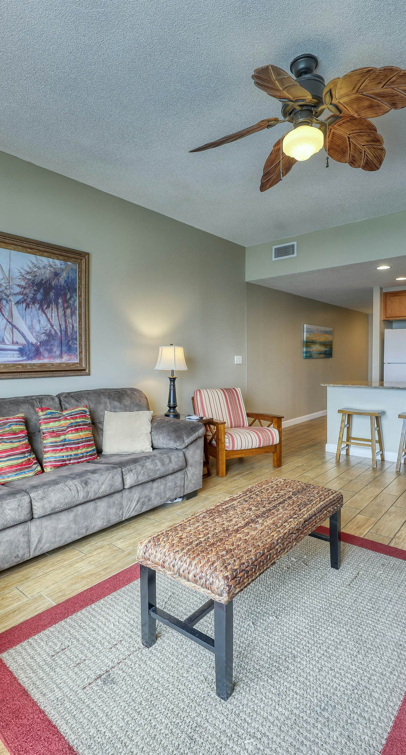 Waterfront condo with furnished balcony, pool, gym & beach