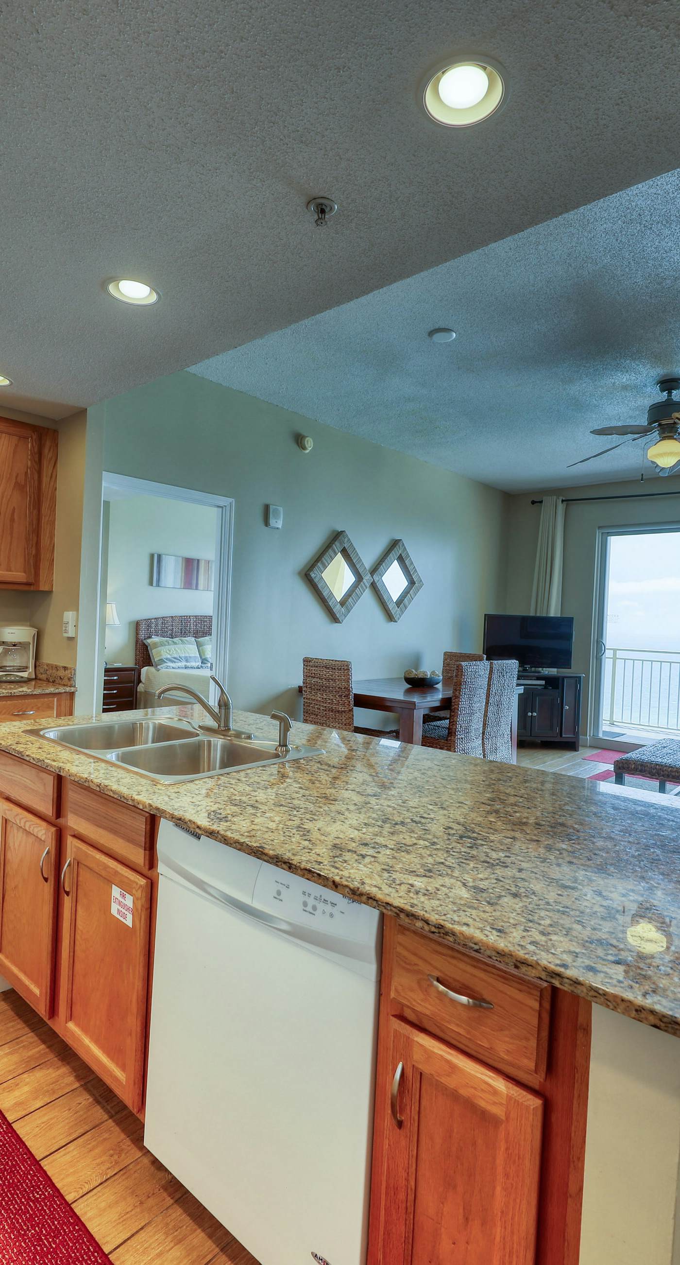 Waterfront condo with furnished balcony, pool, gym & beach