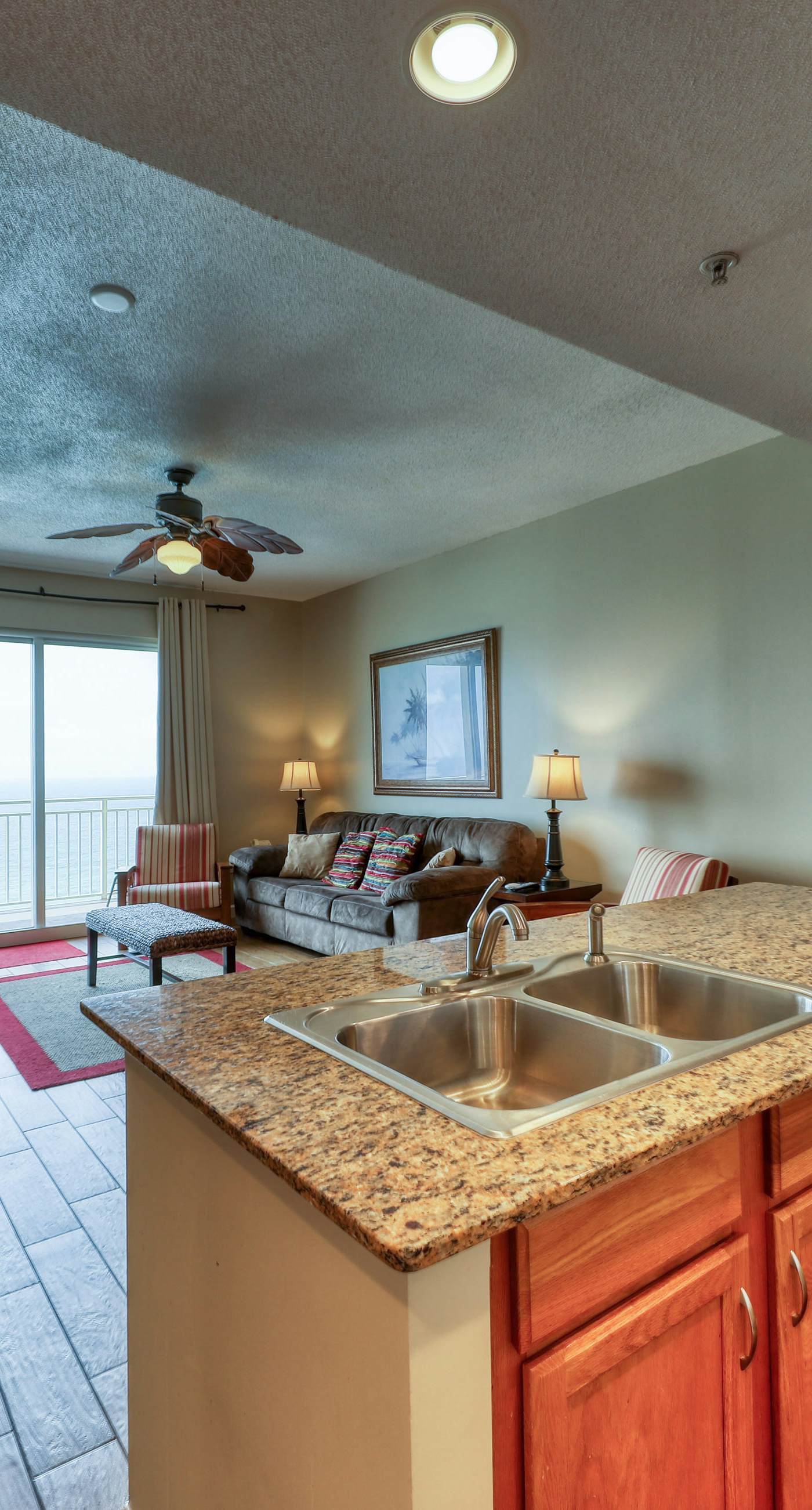 Waterfront condo with furnished balcony, pool, gym & beach