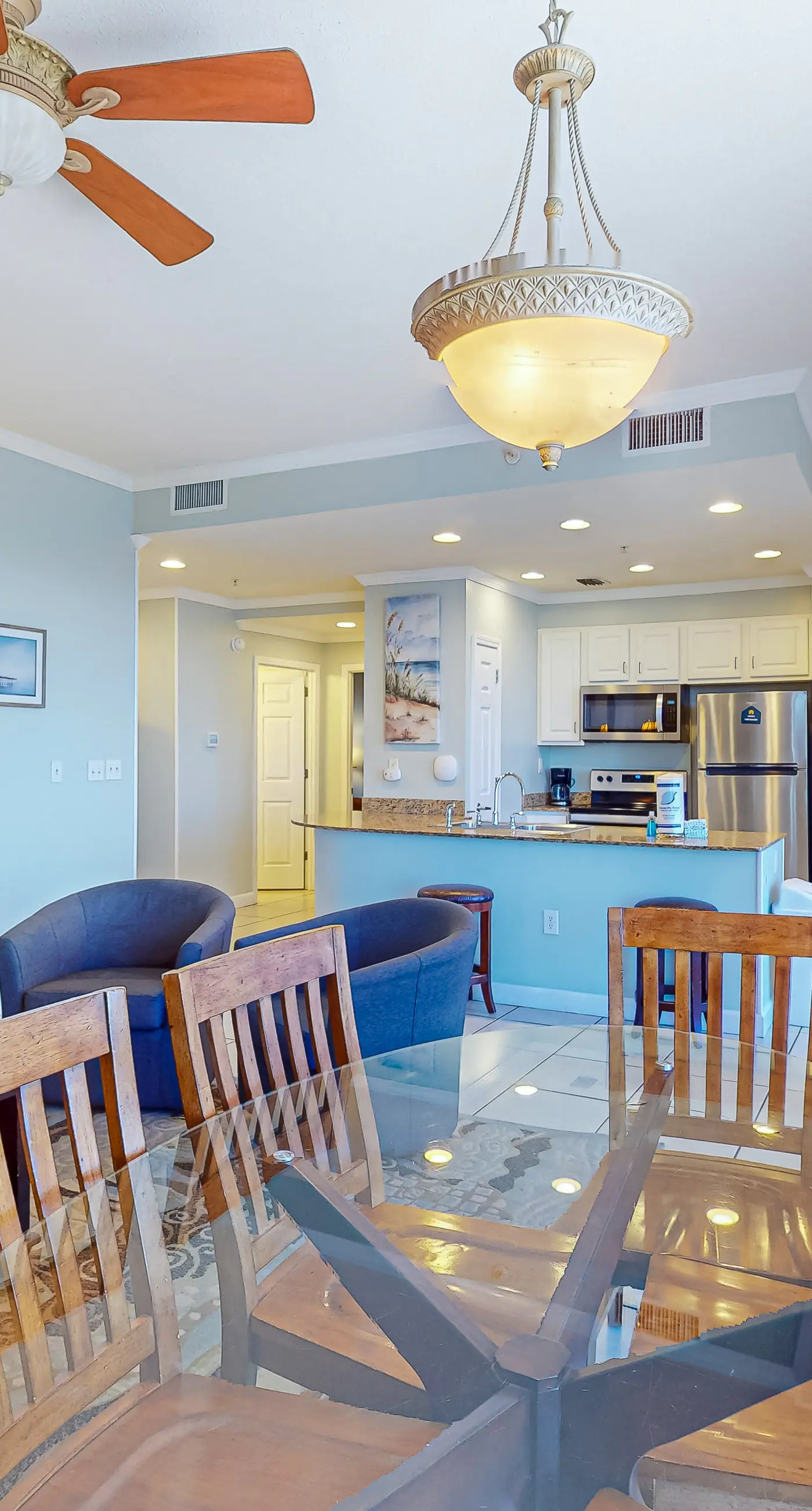 High-end beachfront condo with pools & gym - walk to the beach