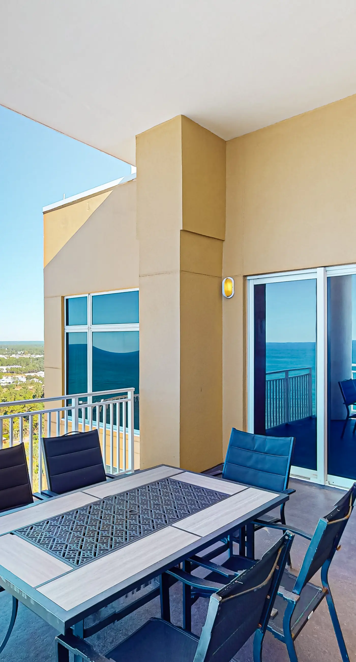 High-end beachfront condo with pools & gym - walk to the beach