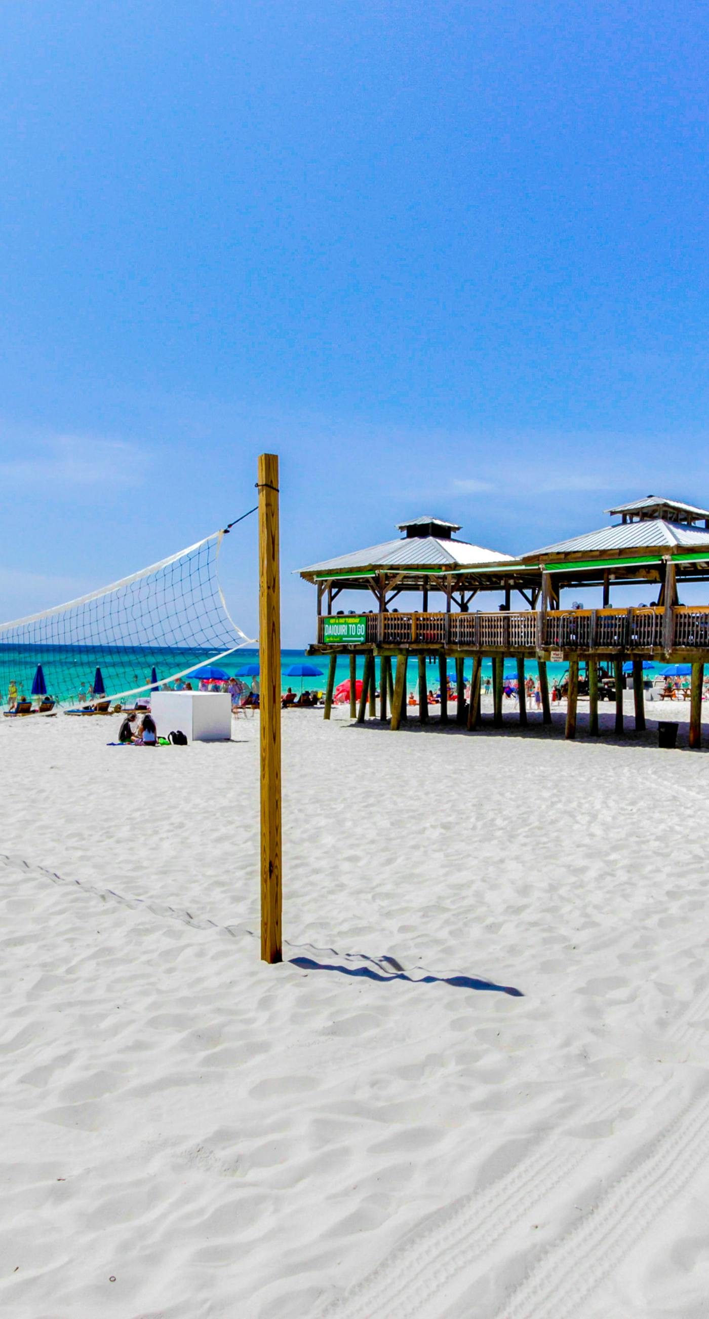 Vibrant vacation home by the beach with pool, hot tub, & fitness facility