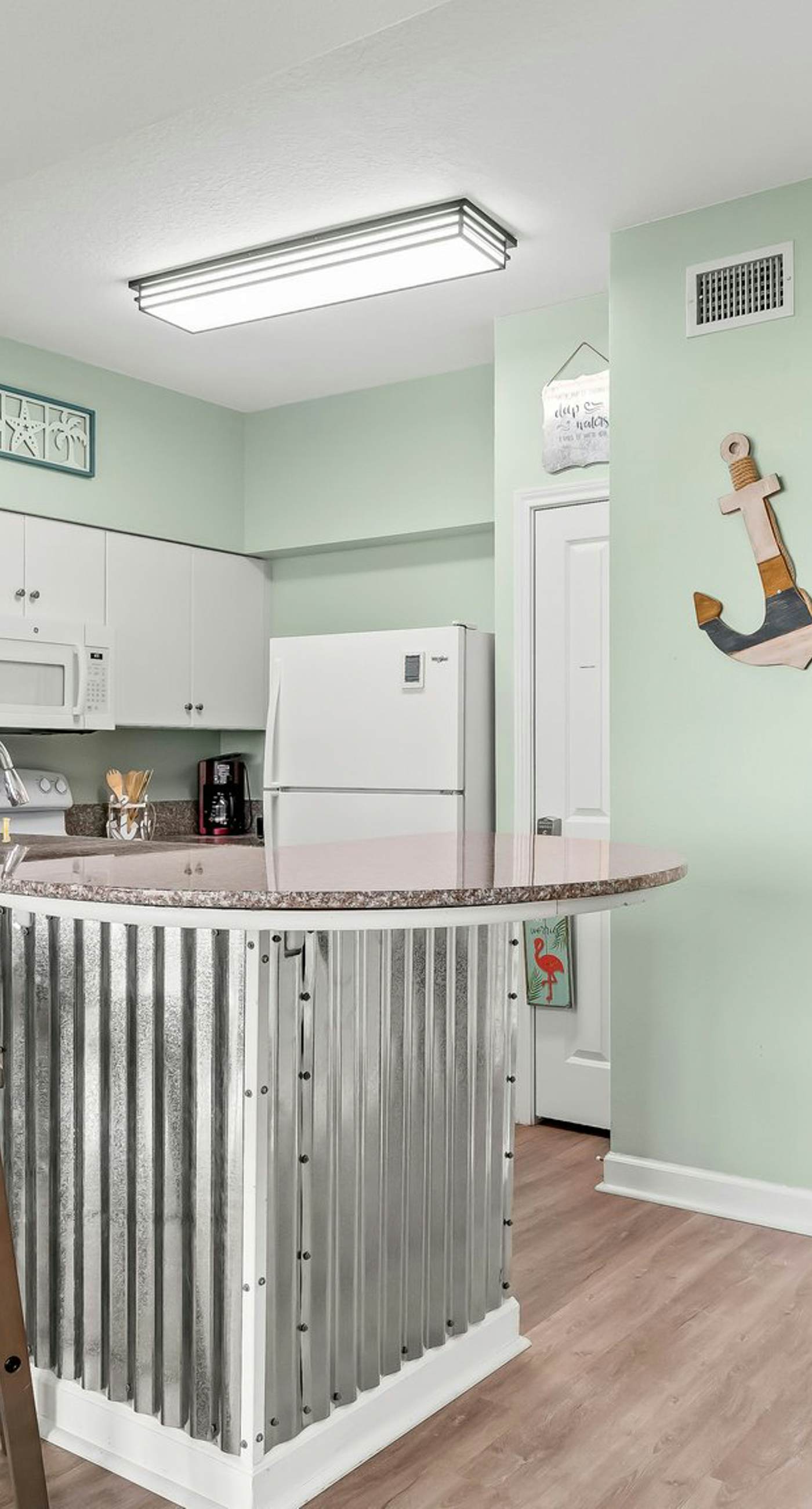 Beachfront retreat with pool, hot tub, gym, & seasonal beach chairs & umbrella