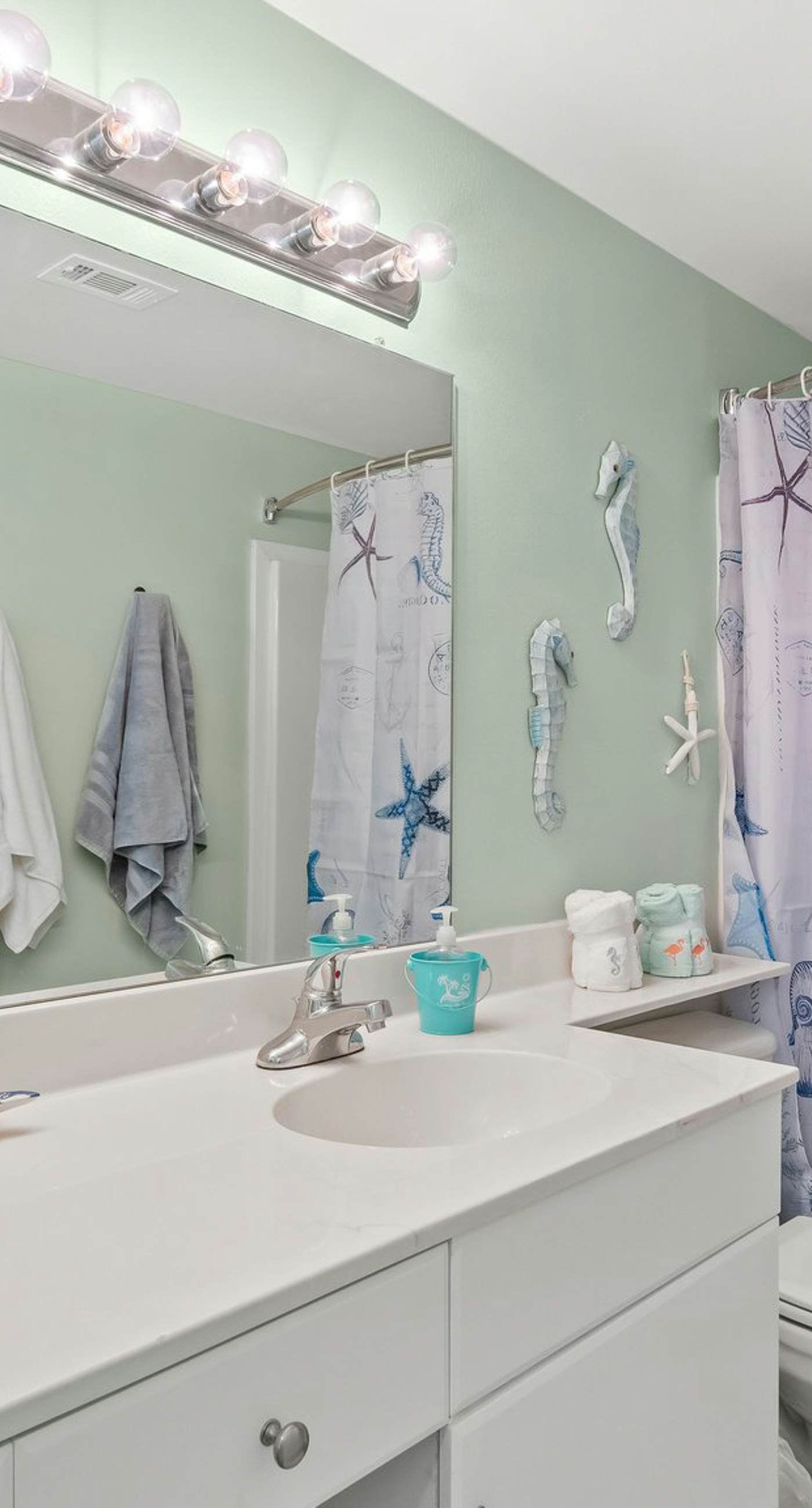 Beachfront retreat with pool, hot tub, gym, & seasonal beach chairs & umbrella