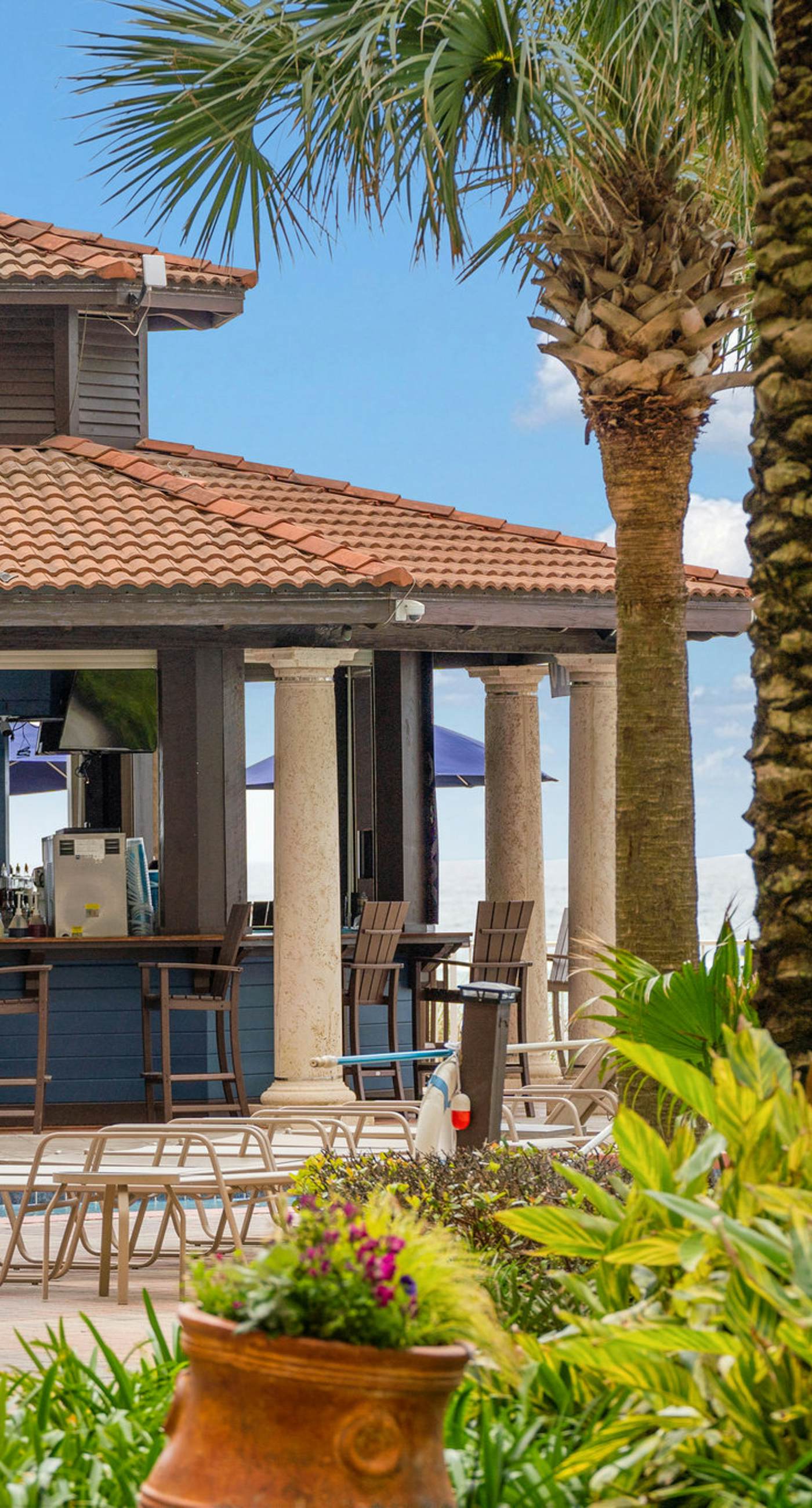 Beachfront retreat with pool, hot tub, gym, & seasonal beach chairs & umbrella