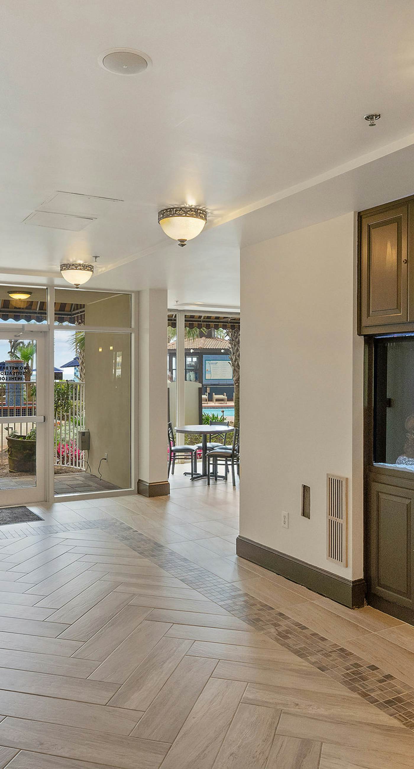 Beachfront retreat with pool, hot tub, gym, & seasonal beach chairs & umbrella