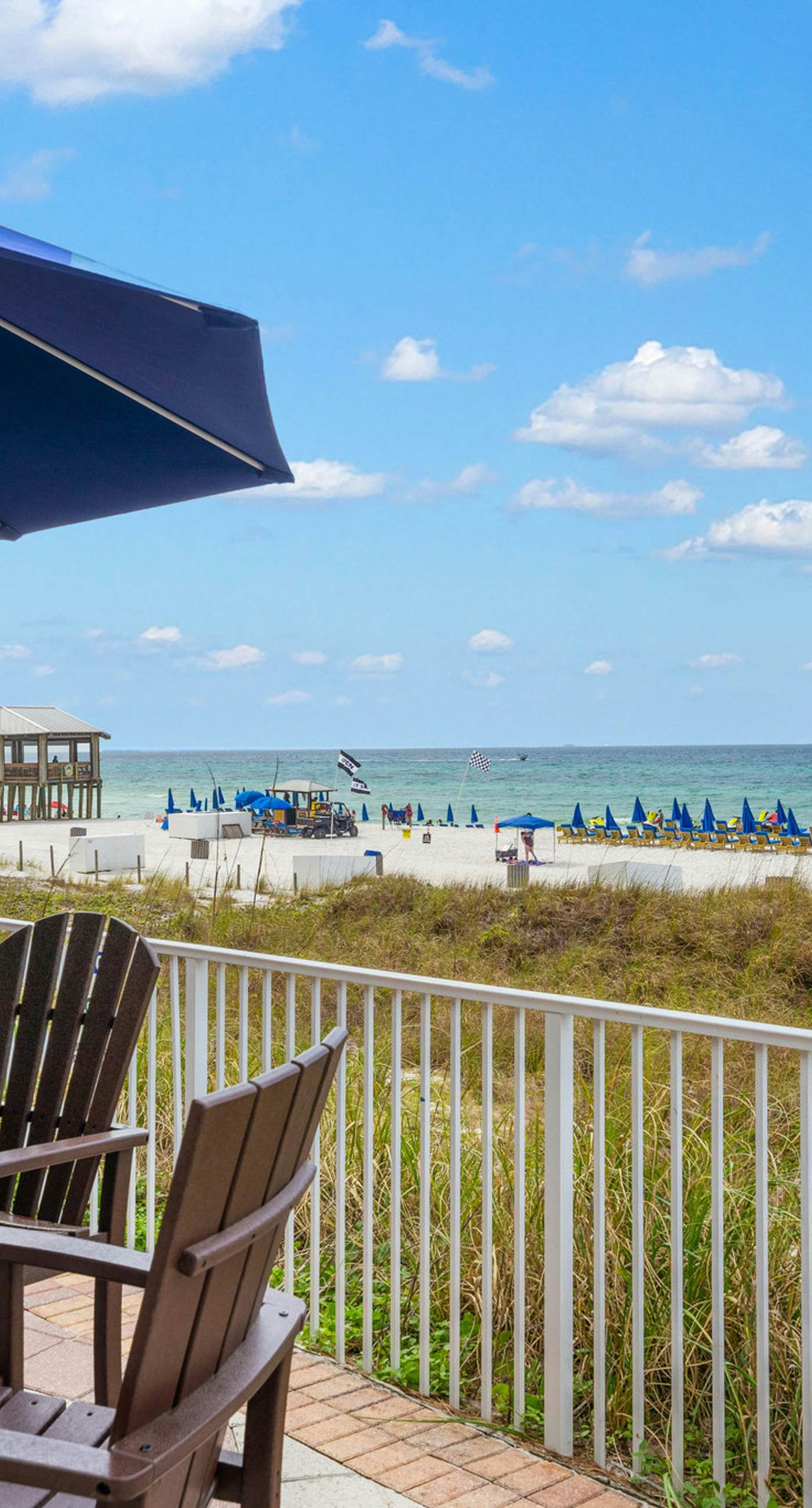 Beachfront retreat with pool, hot tub, gym, & seasonal beach chairs & umbrella