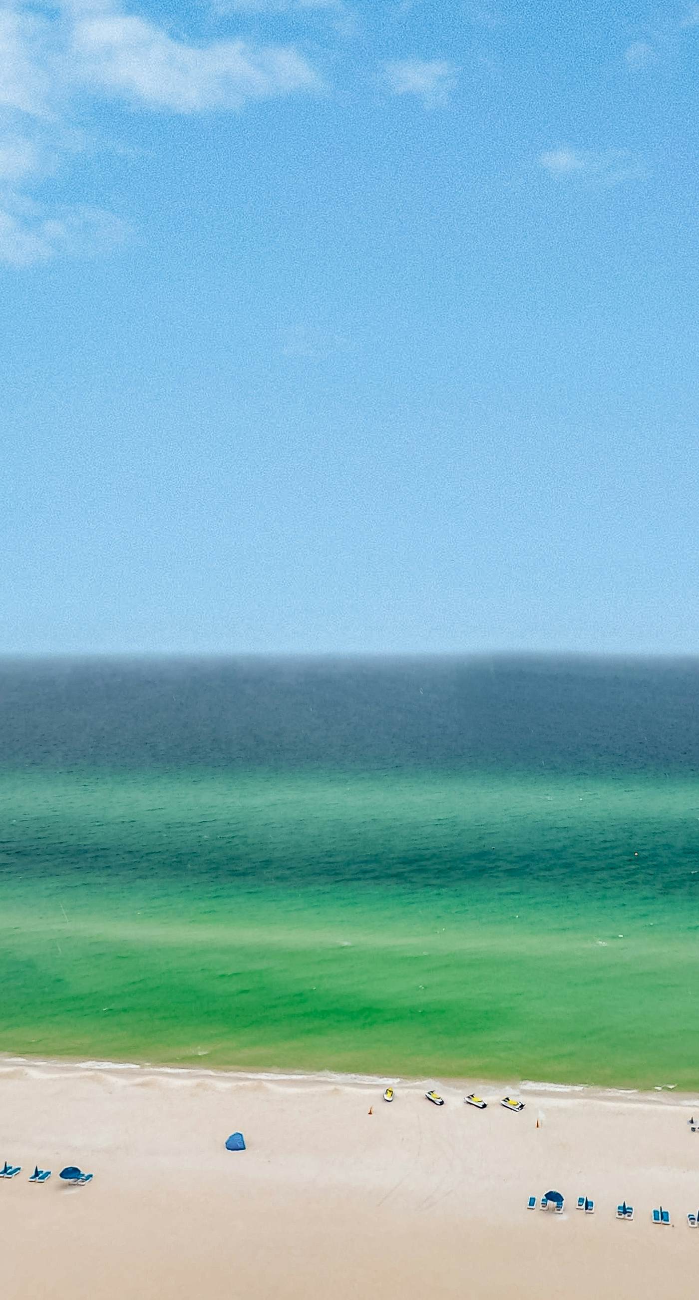 Zen Gulf-front condo with amazing views, pool, beach access, gym & game room