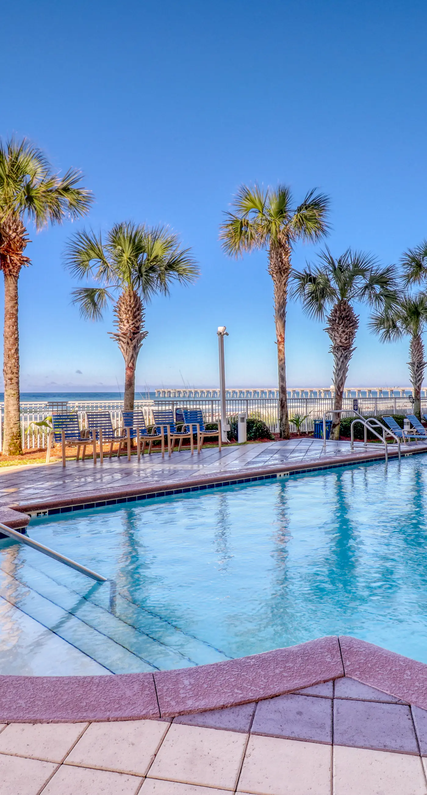 Gulf-front condo with free beach service, balcony & pool