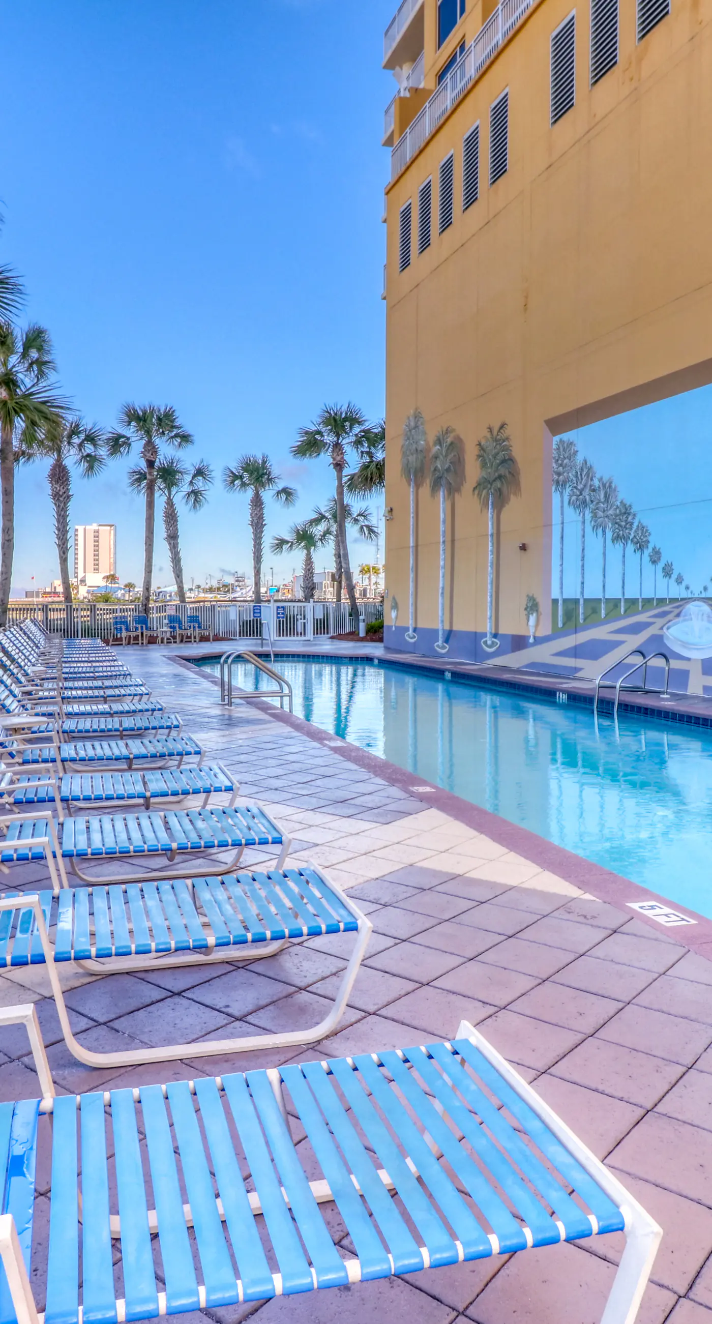 Gulf-front condo with free beach service, balcony & pool