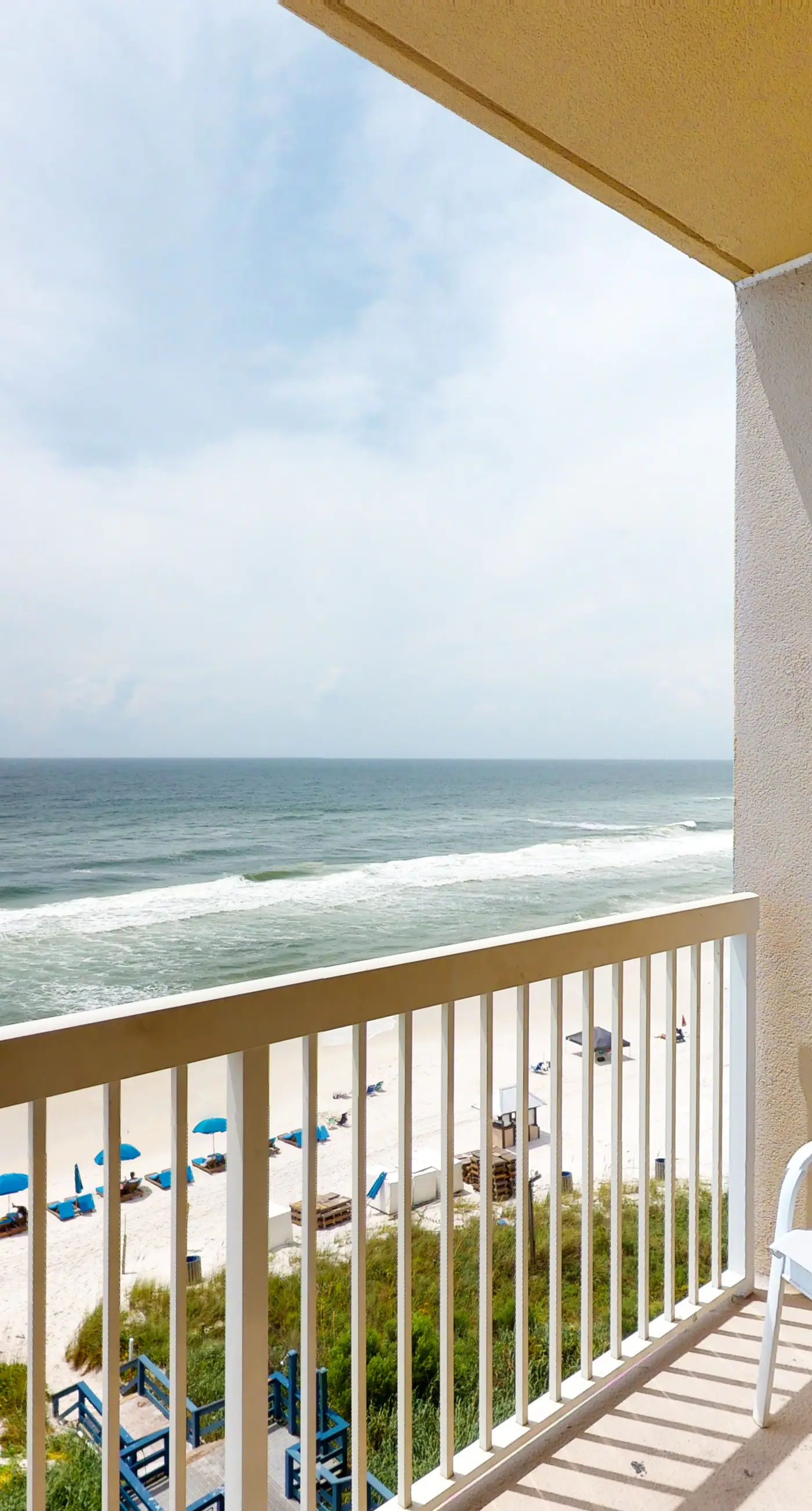 Waterfront condo overlooking the beach with pools, gym, & beach access