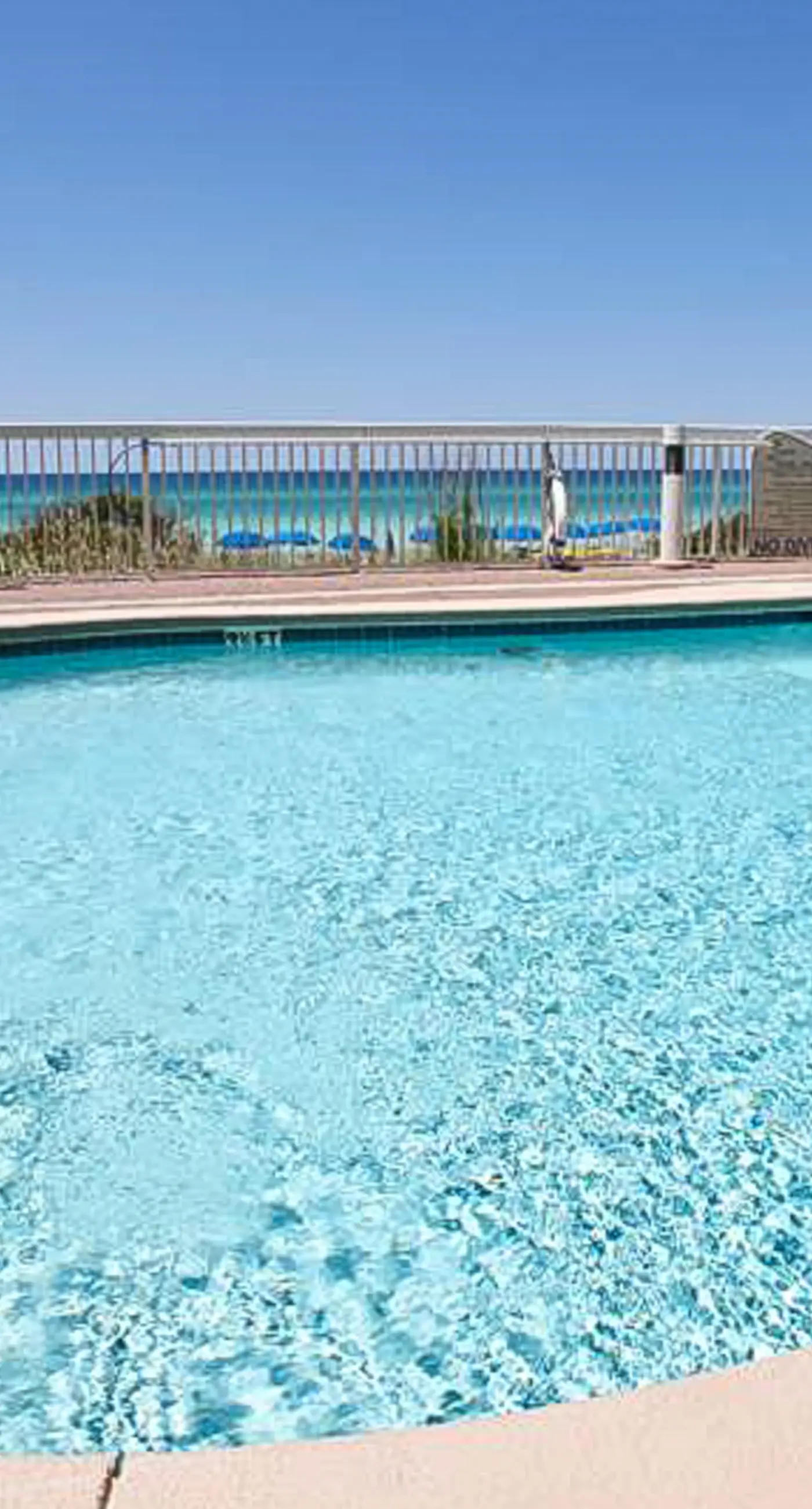 Sleek & modern, beachfront condo w/ a furnished balcony, views, & shared pools