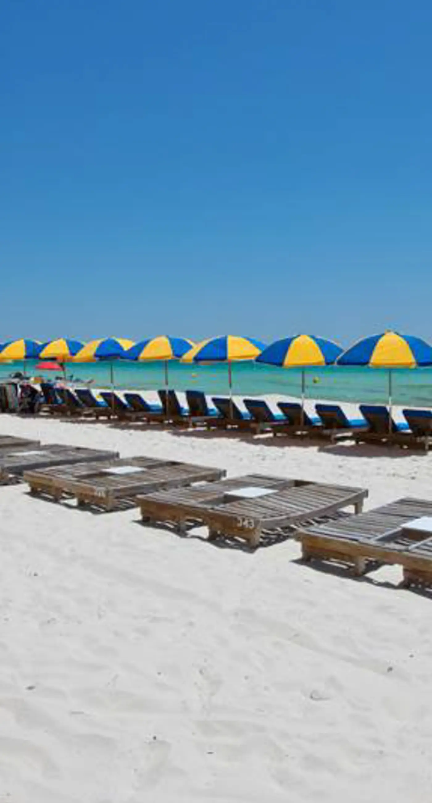 Sleek & modern, beachfront condo w/ a furnished balcony, views, & shared pools