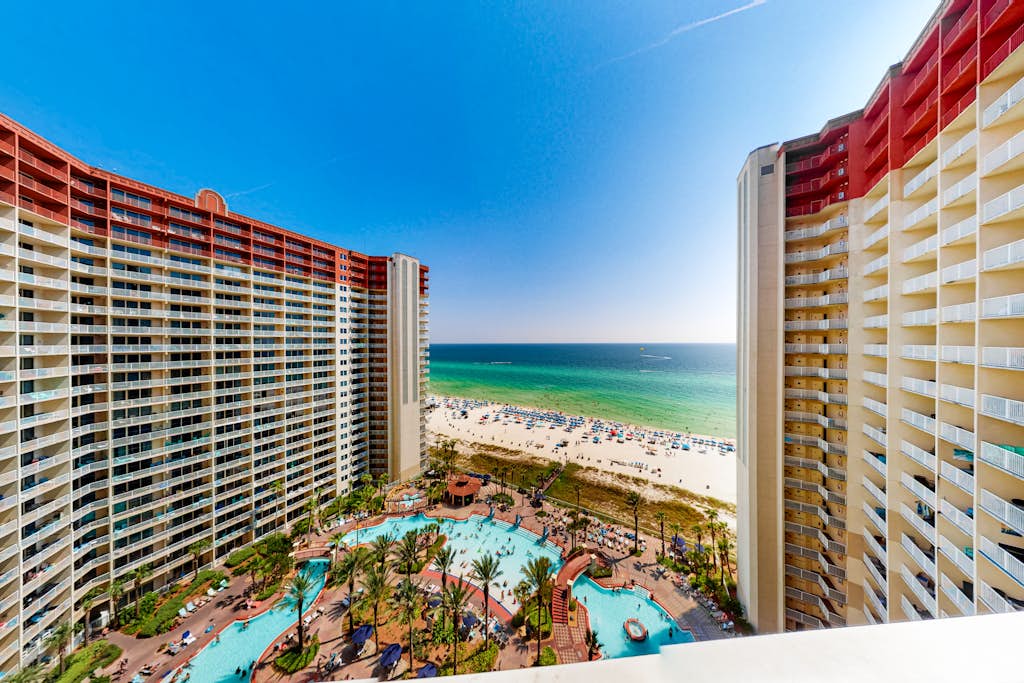 Updated beachfront condo with pool, hot tub, W/D, & central AC