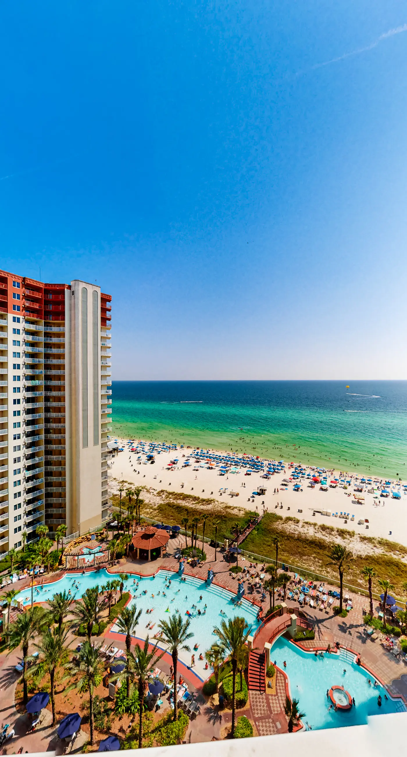 Updated beachfront condo with pool, hot tub, W/D, & central AC