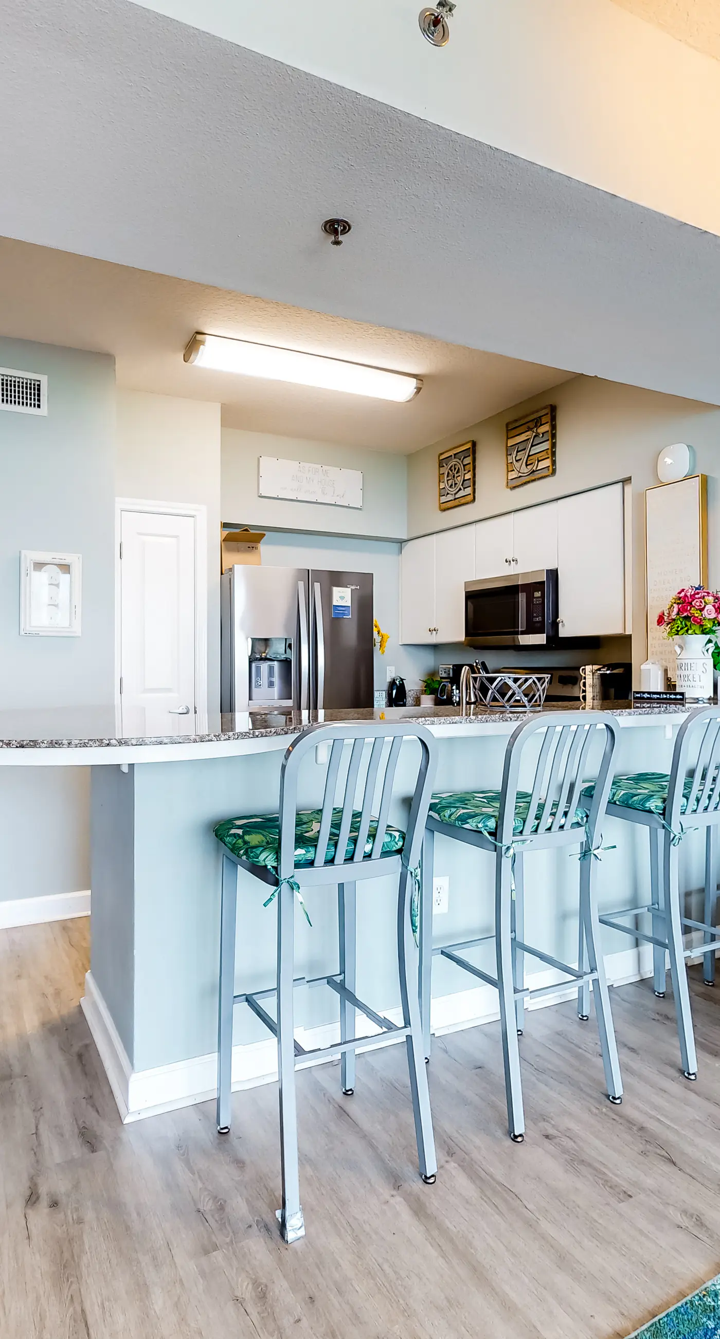 Updated beachfront condo with pool, hot tub, W/D, & central AC