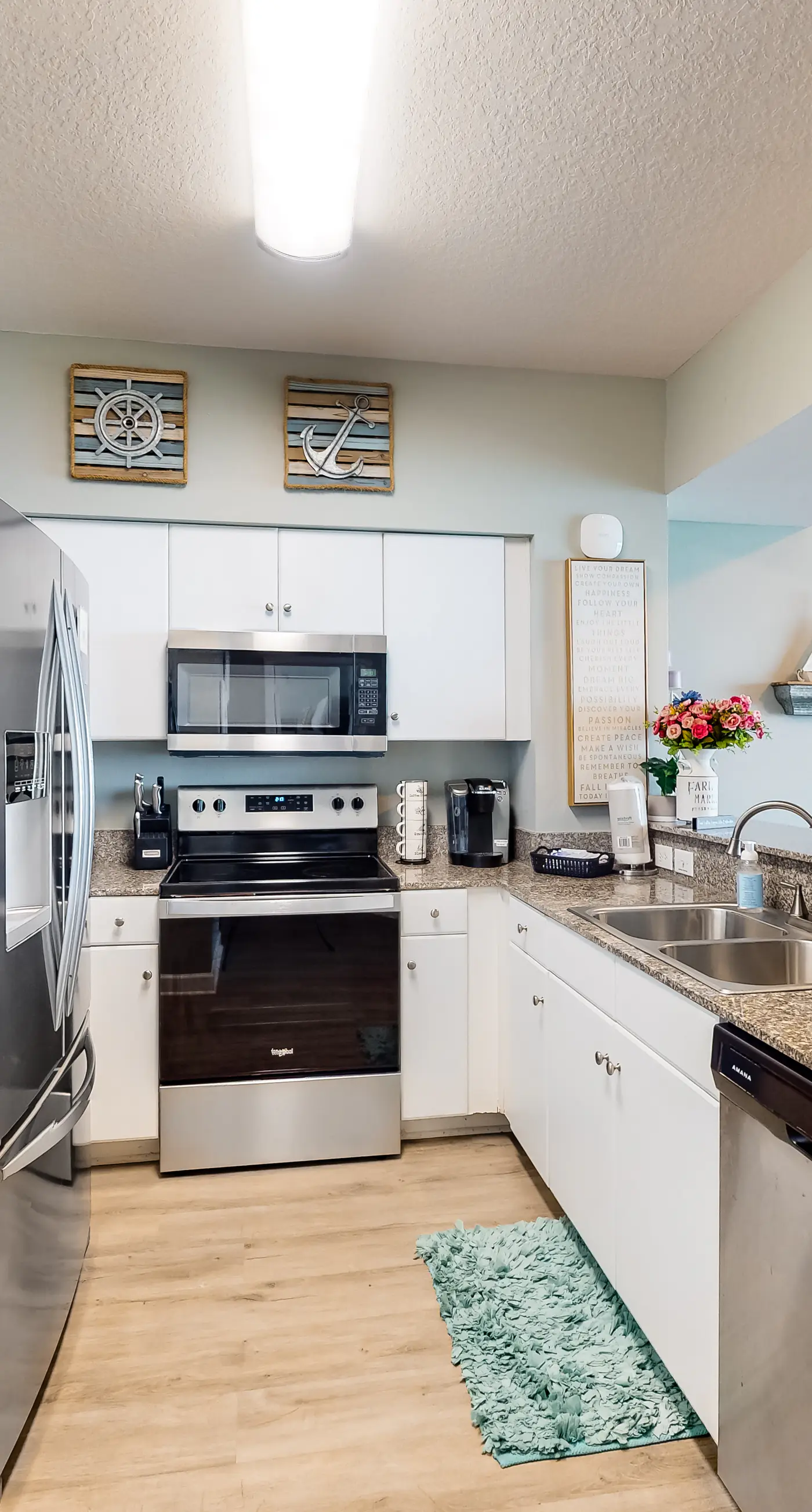 Updated beachfront condo with pool, hot tub, W/D, & central AC