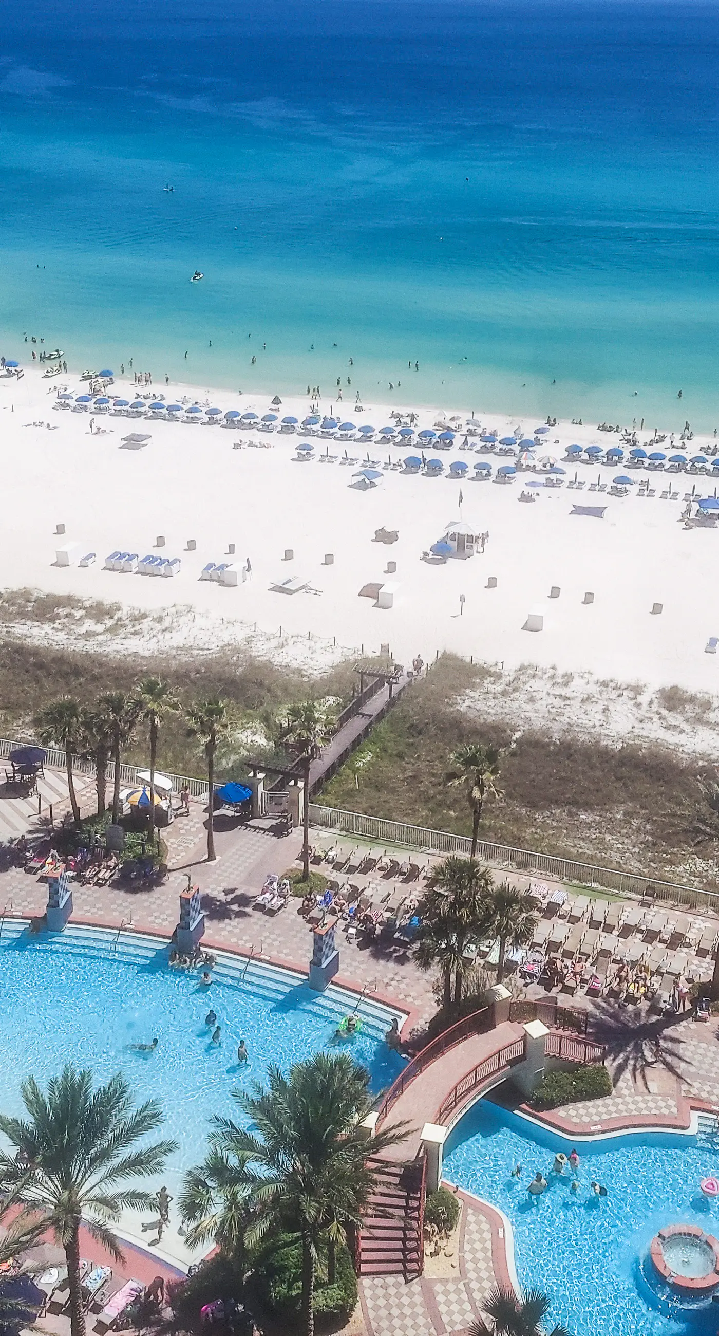 Updated beachfront condo with pool, hot tub, W/D, & central AC