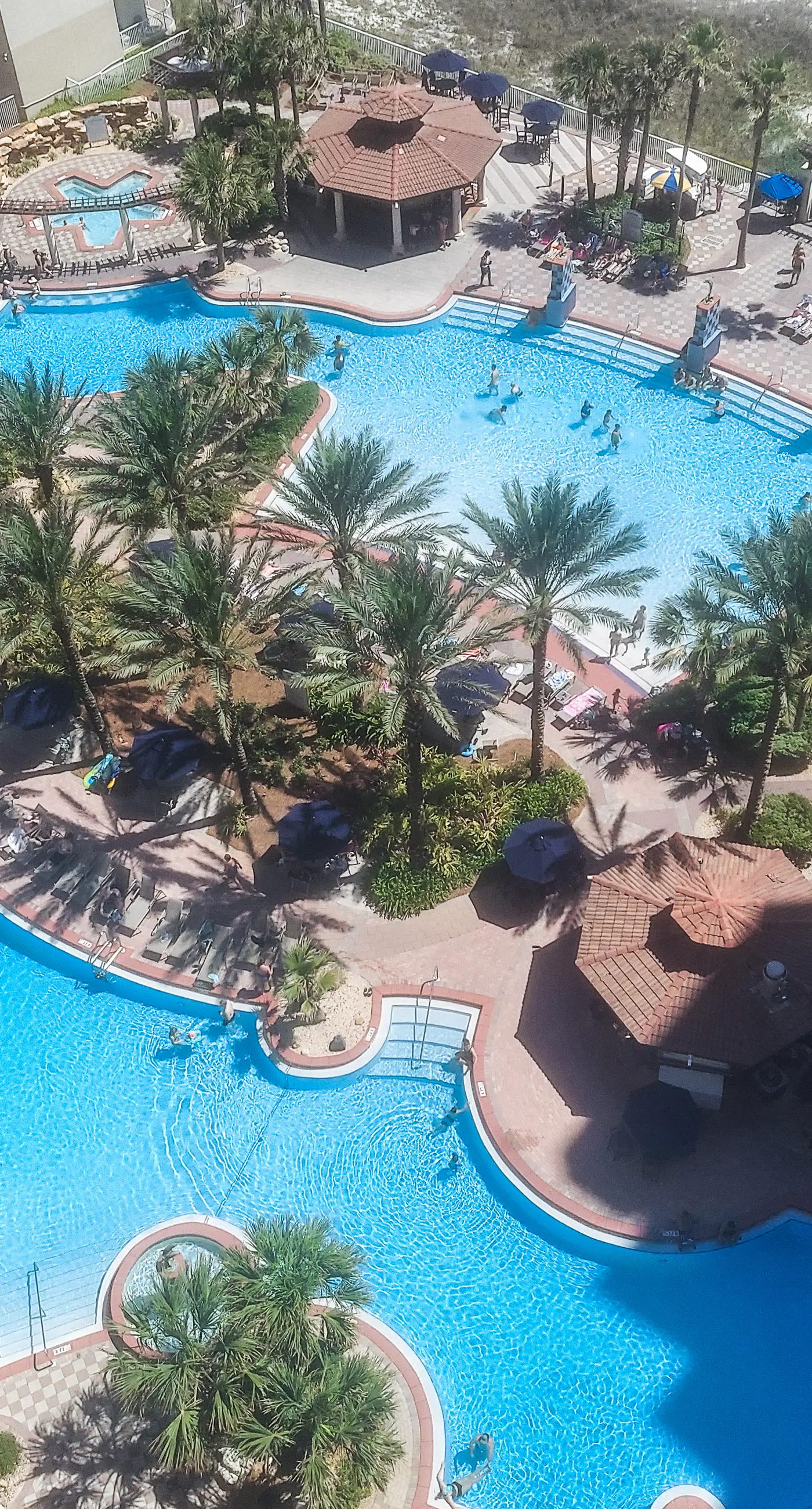 Updated beachfront condo with pool, hot tub, W/D, & central AC