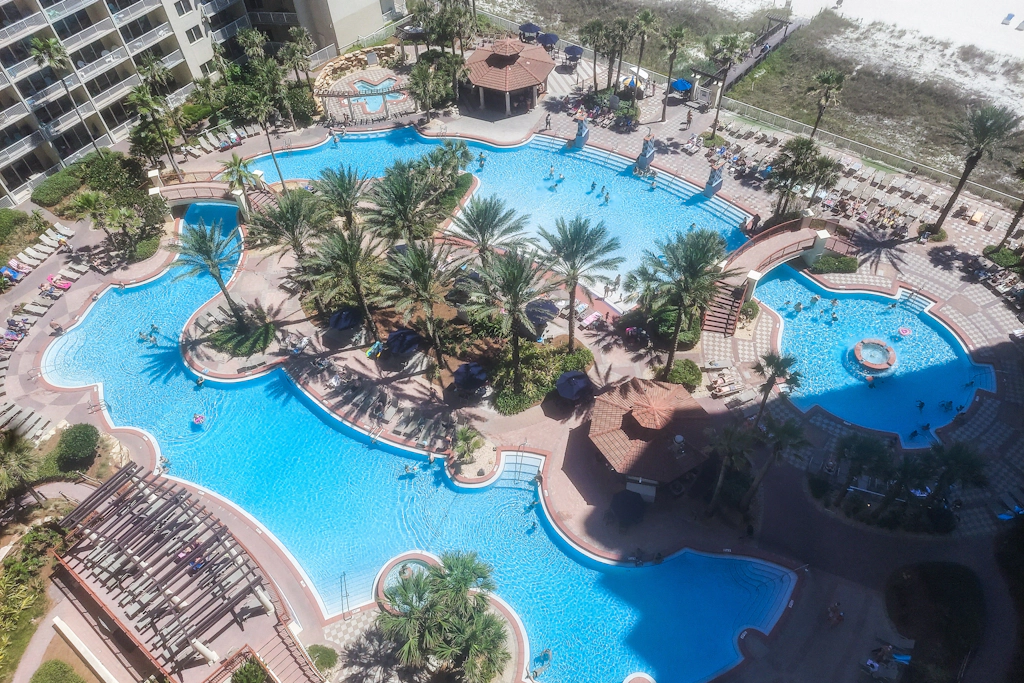 Updated beachfront condo with pool, hot tub, WD, & central AC