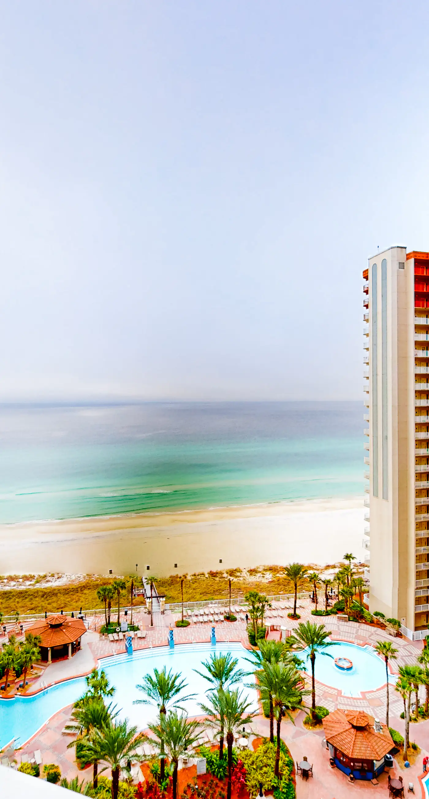 Gulf-view resort condo with pools, hot tubs, & on-site dining - walk to beach