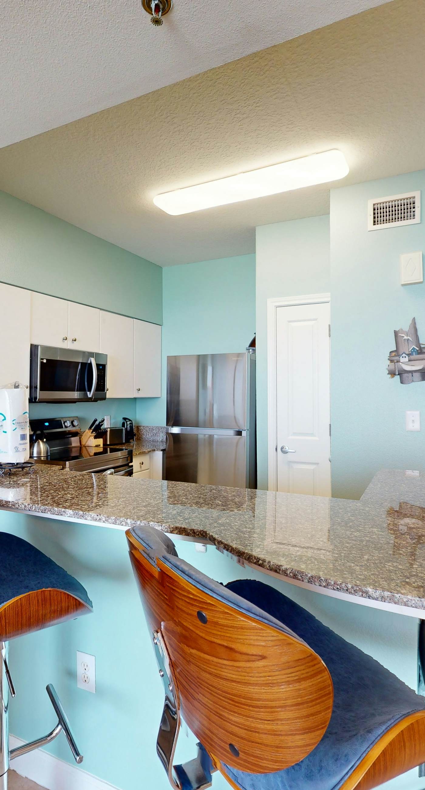 Updated oceanfront condo with pools, hot tub, W/D, AC, & views