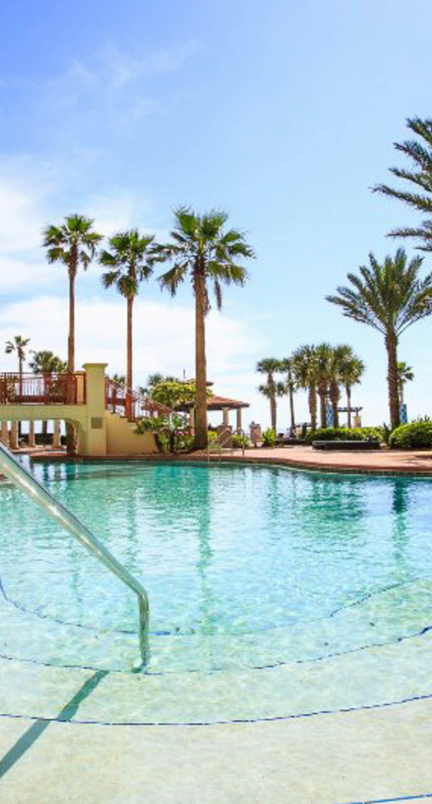 Updated oceanfront condo with pools, hot tub, W/D, AC, & views