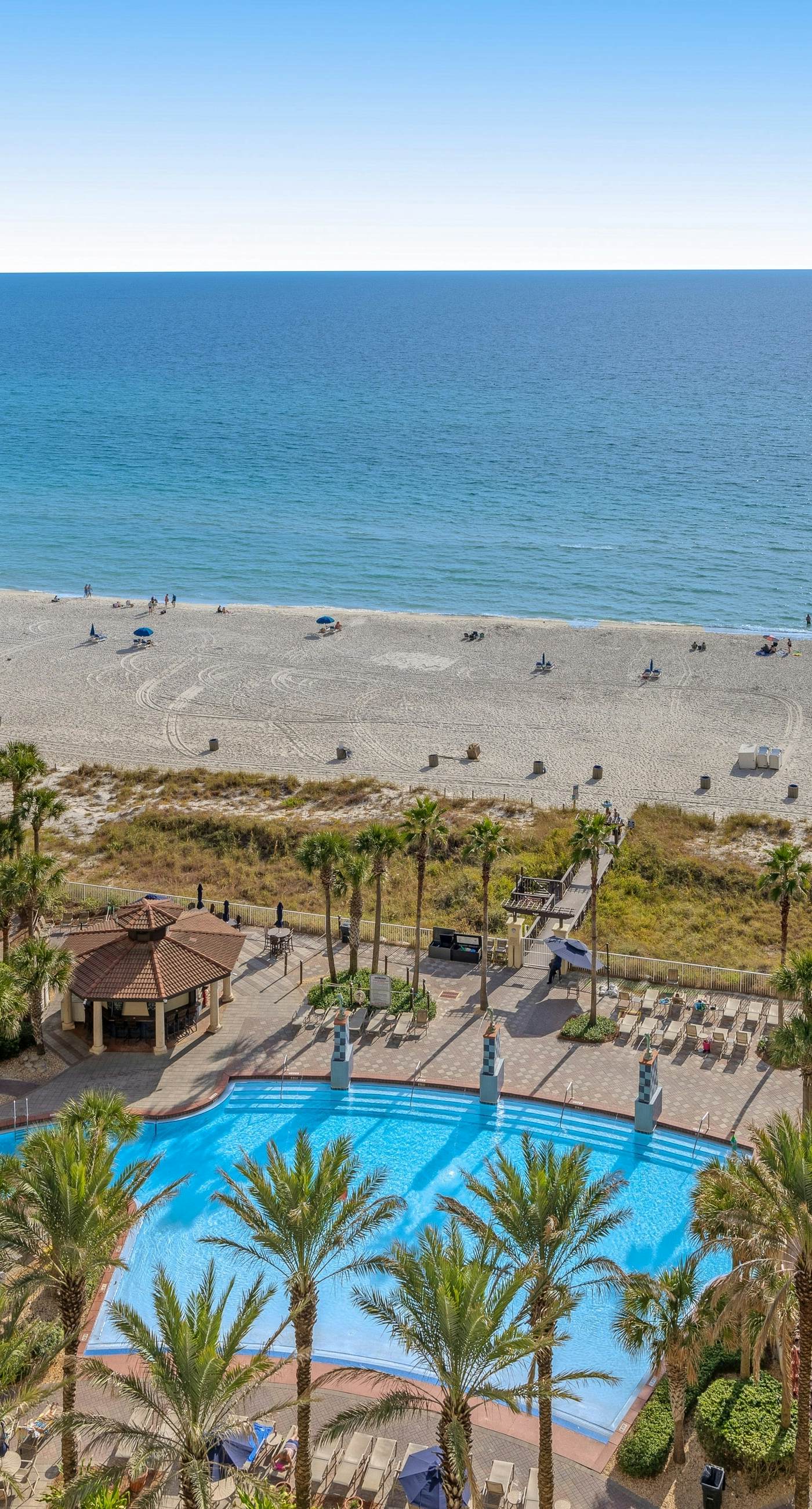 Beachfront condo with Gulf views, pools, hot tubs, sauna, & fitness center