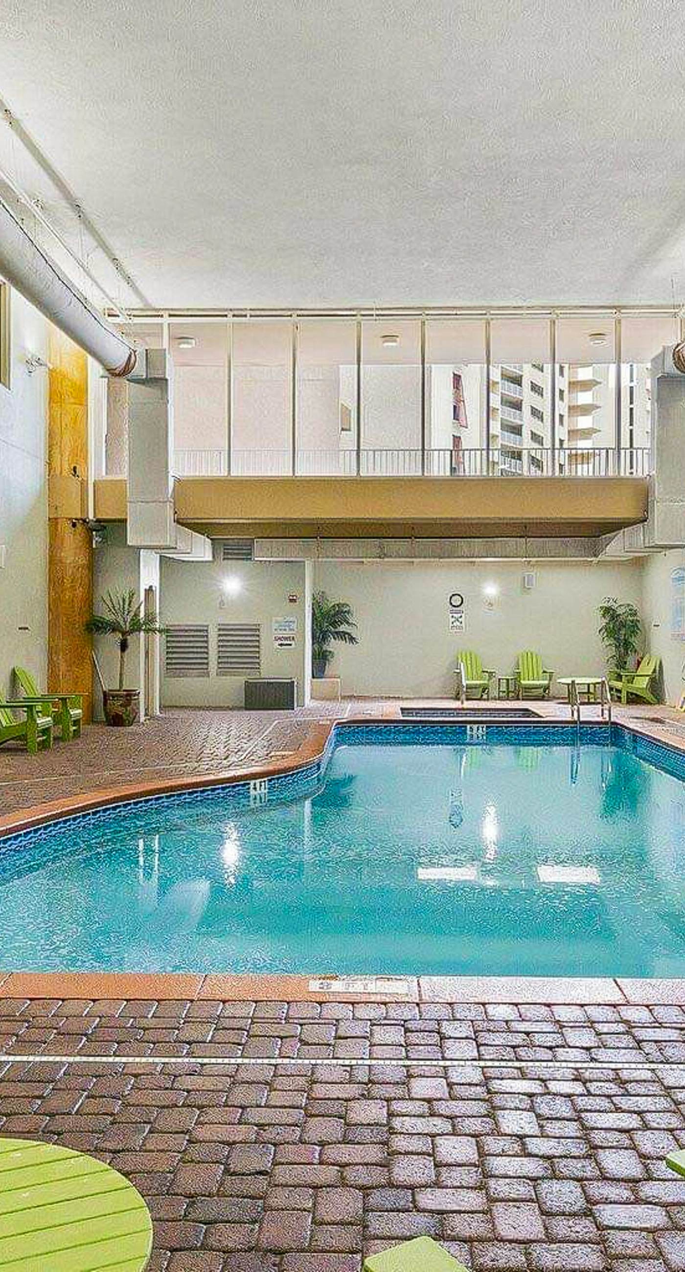 Beachfront condo with Gulf views, pools, hot tubs, sauna, & fitness center