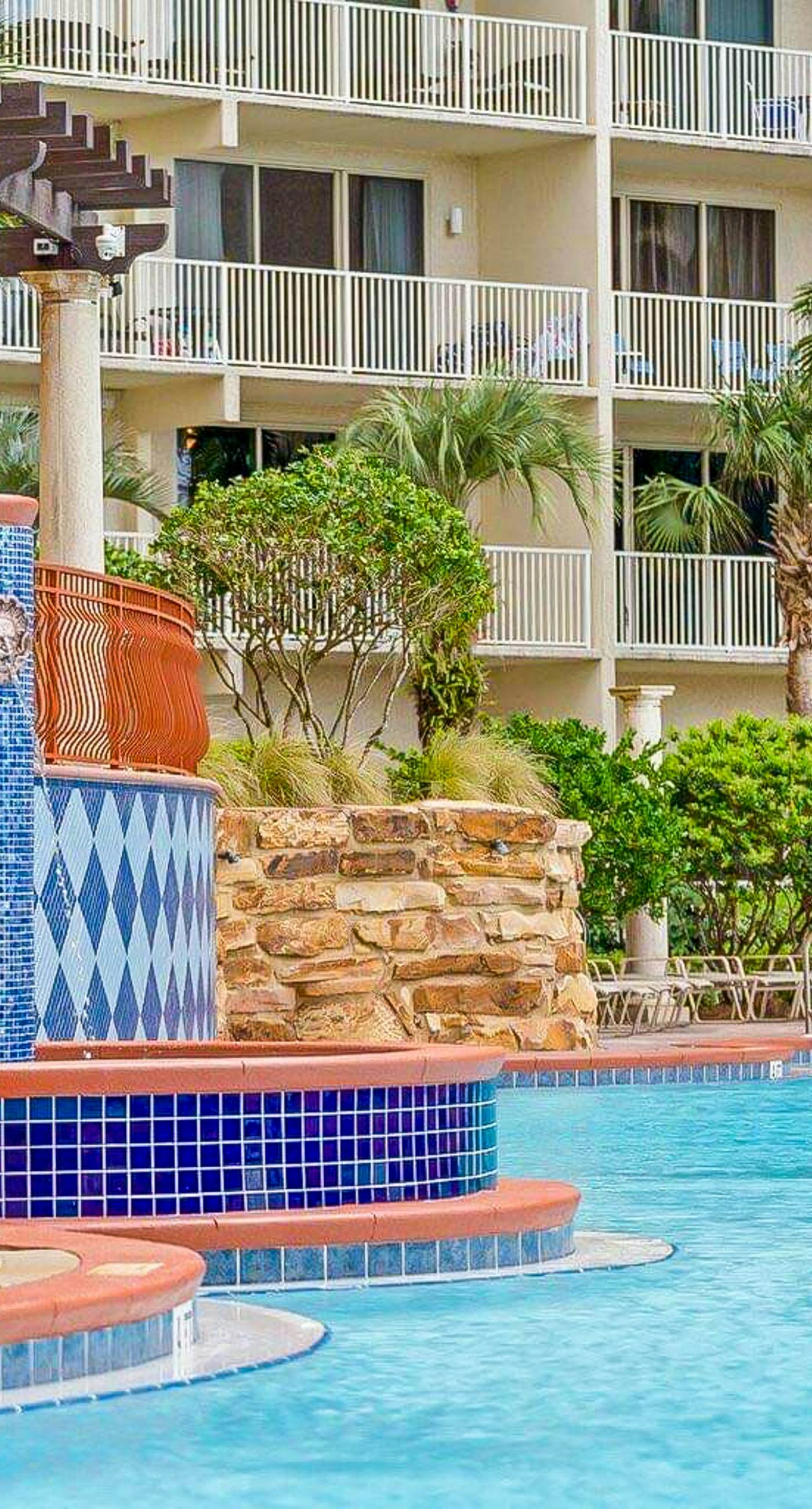 Beachfront condo with Gulf views, pools, hot tubs, sauna, & fitness center