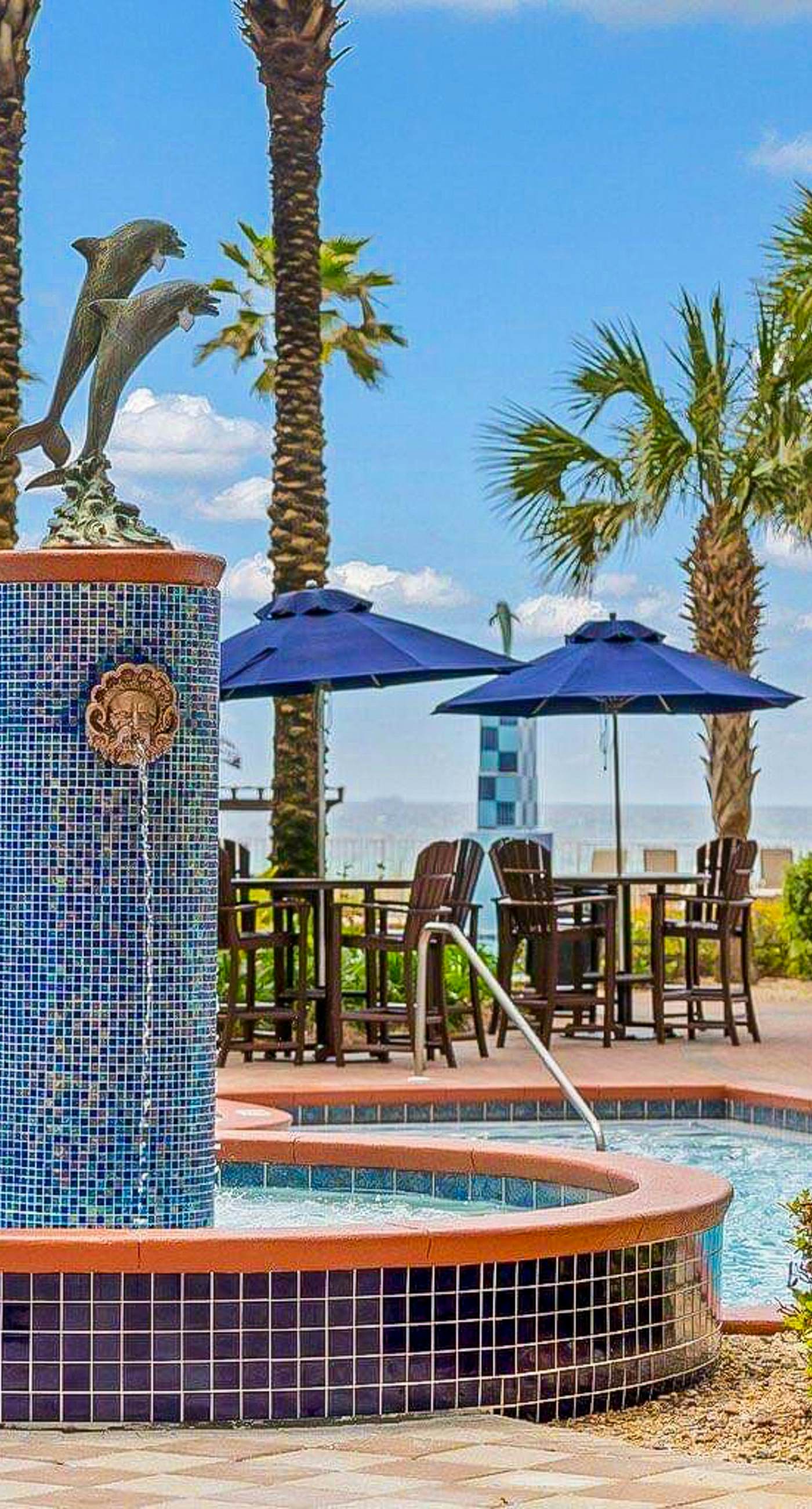 Beachfront condo with Gulf views, pools, hot tubs, sauna, & fitness center