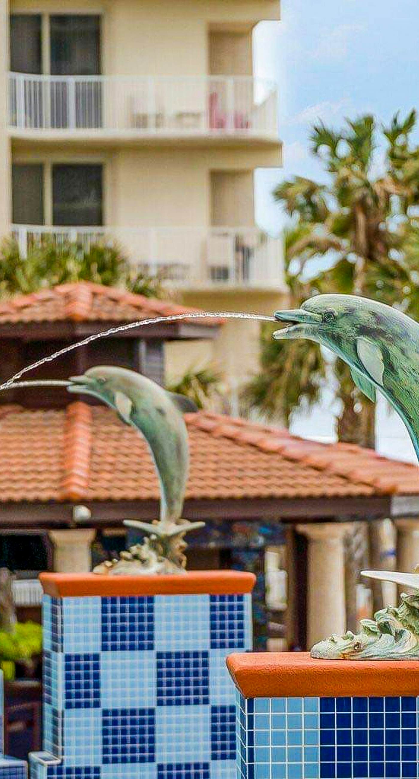 Beachfront condo with Gulf views, pools, hot tubs, sauna, & fitness center