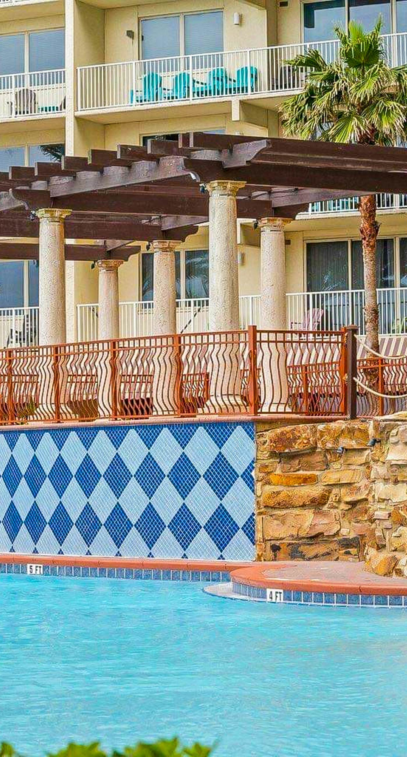 Beachfront condo with Gulf views, pools, hot tubs, sauna, & fitness center