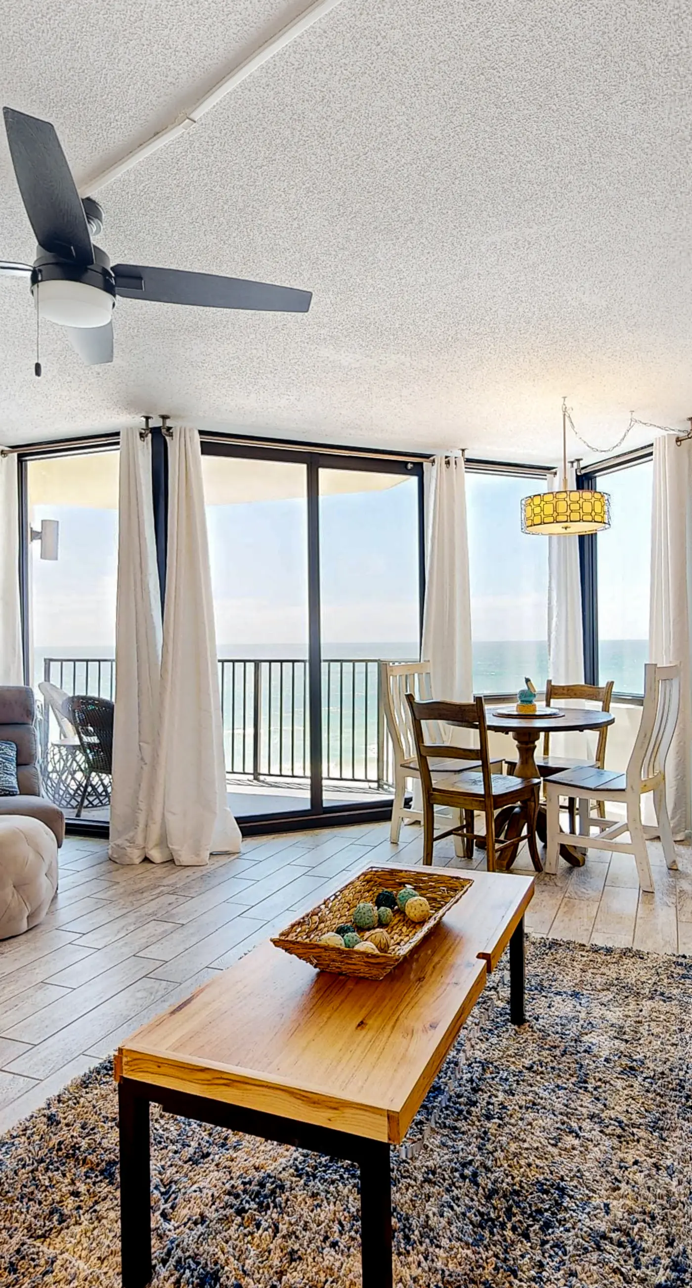 Gulf-view condo with pools, beach access, gym, grills, & updated interior