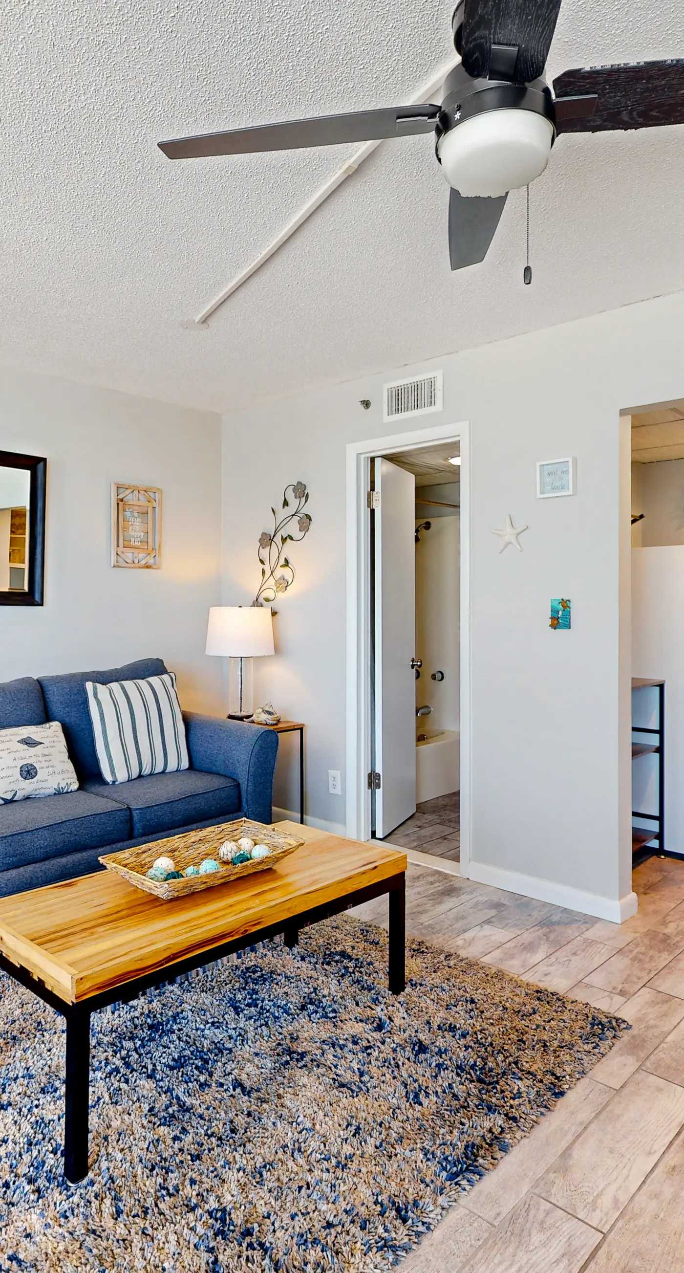 Gulf-view condo with pools, beach access, gym, grills, & updated interior