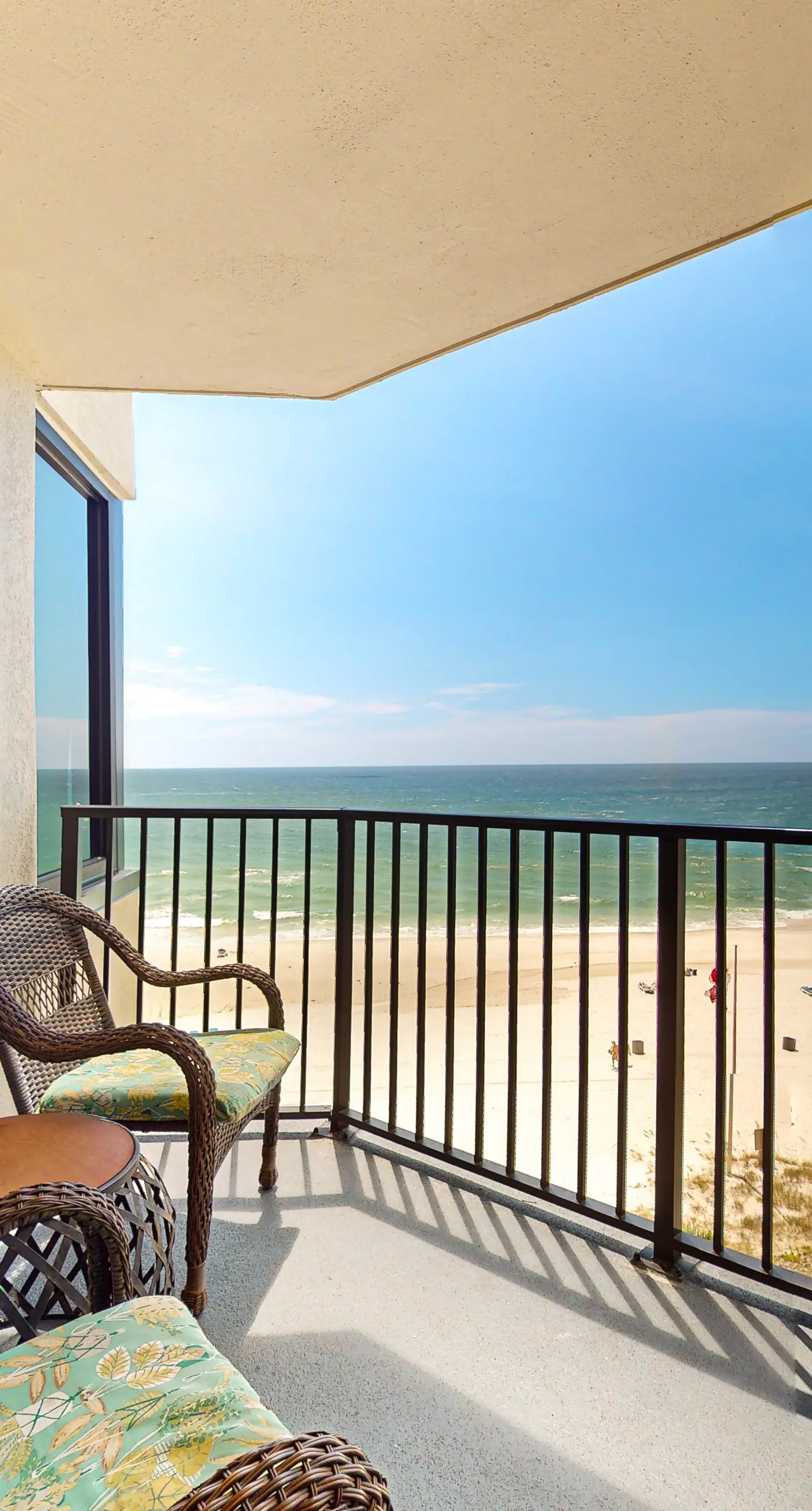 Gulf-view condo with pools, beach access, gym, grills, & updated interior