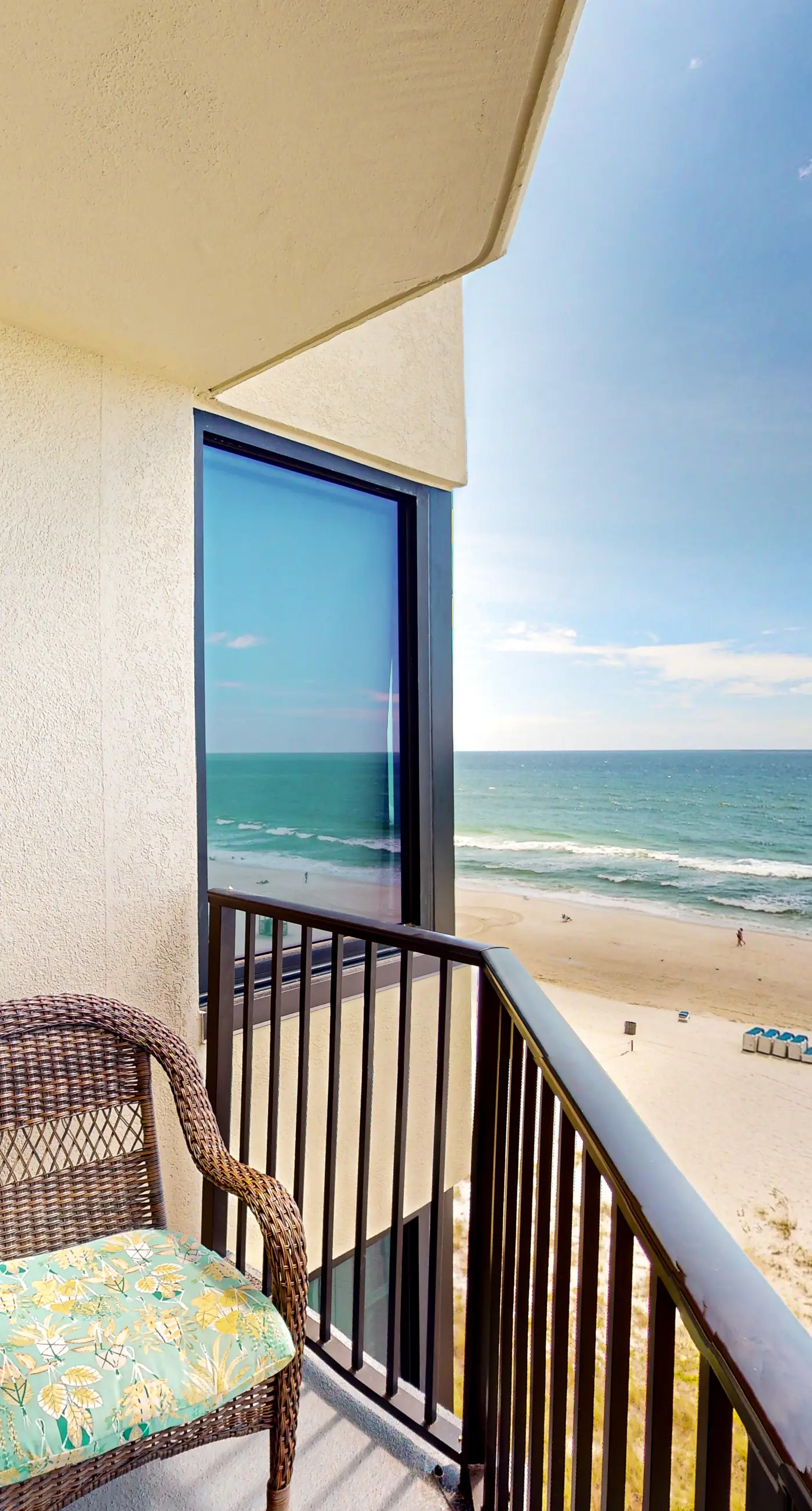 Gulf-view condo with pools, beach access, gym, grills, & updated interior