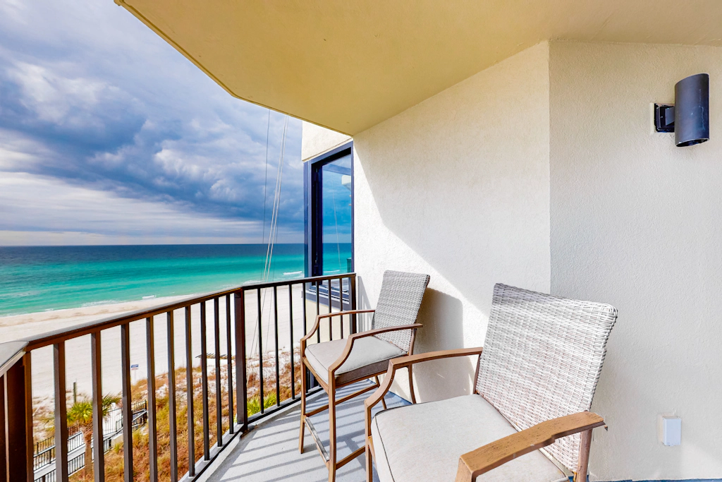 Beachfront condo with a private balcony, three pools, tennis, & picnic area